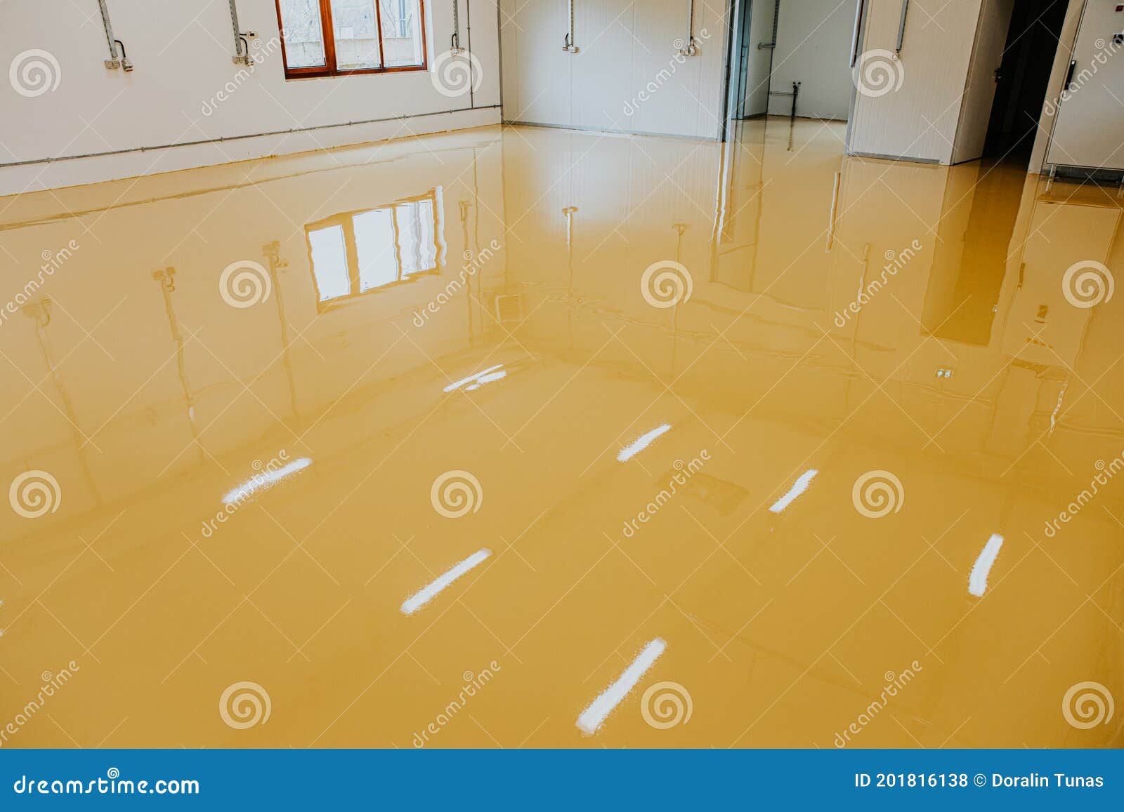 New Epoxy Floor in Warehouse Factory. Construction Series Stock Photo