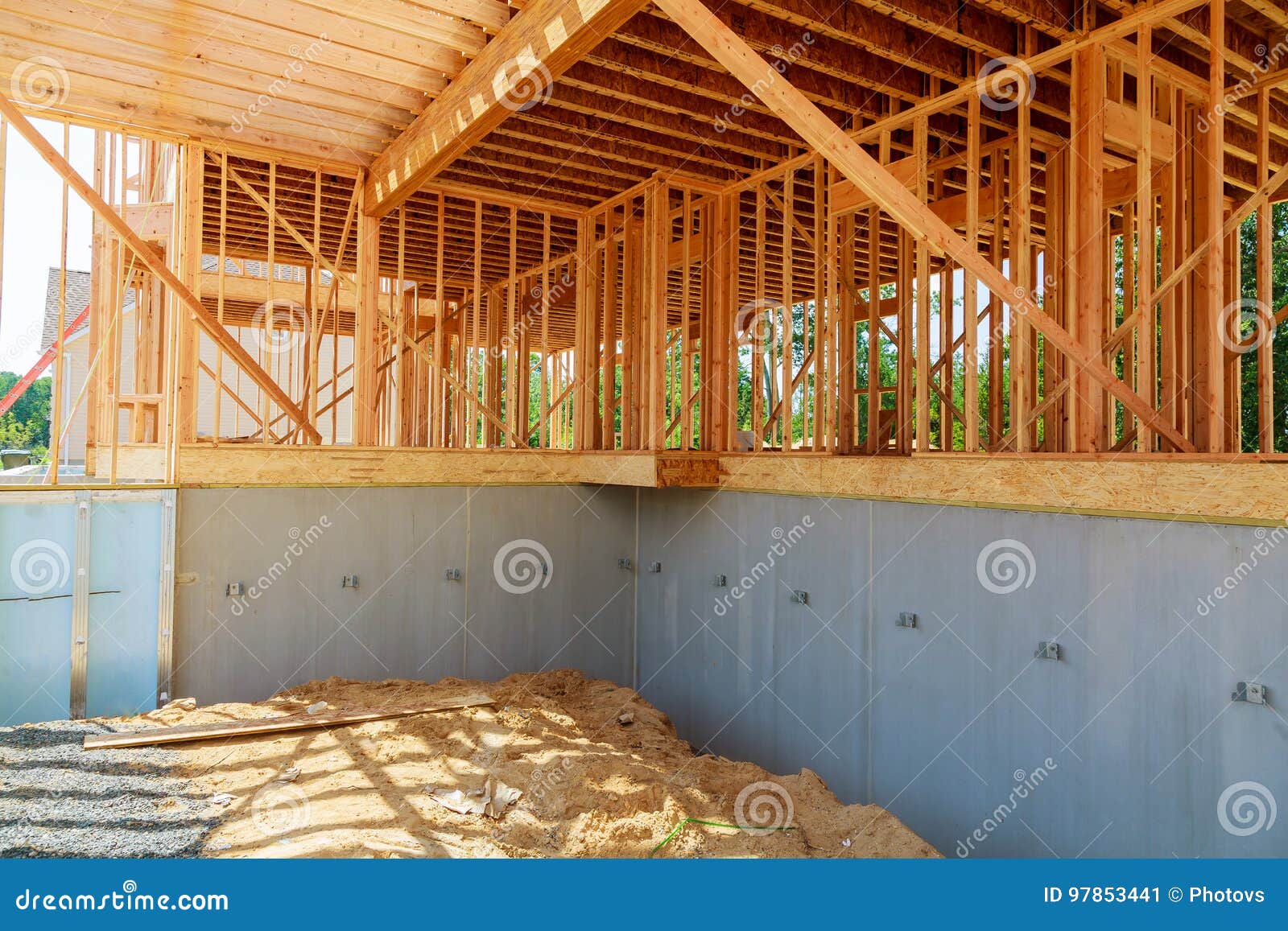 New Home Construction of a Cement Block Home with Wooden Stock Image