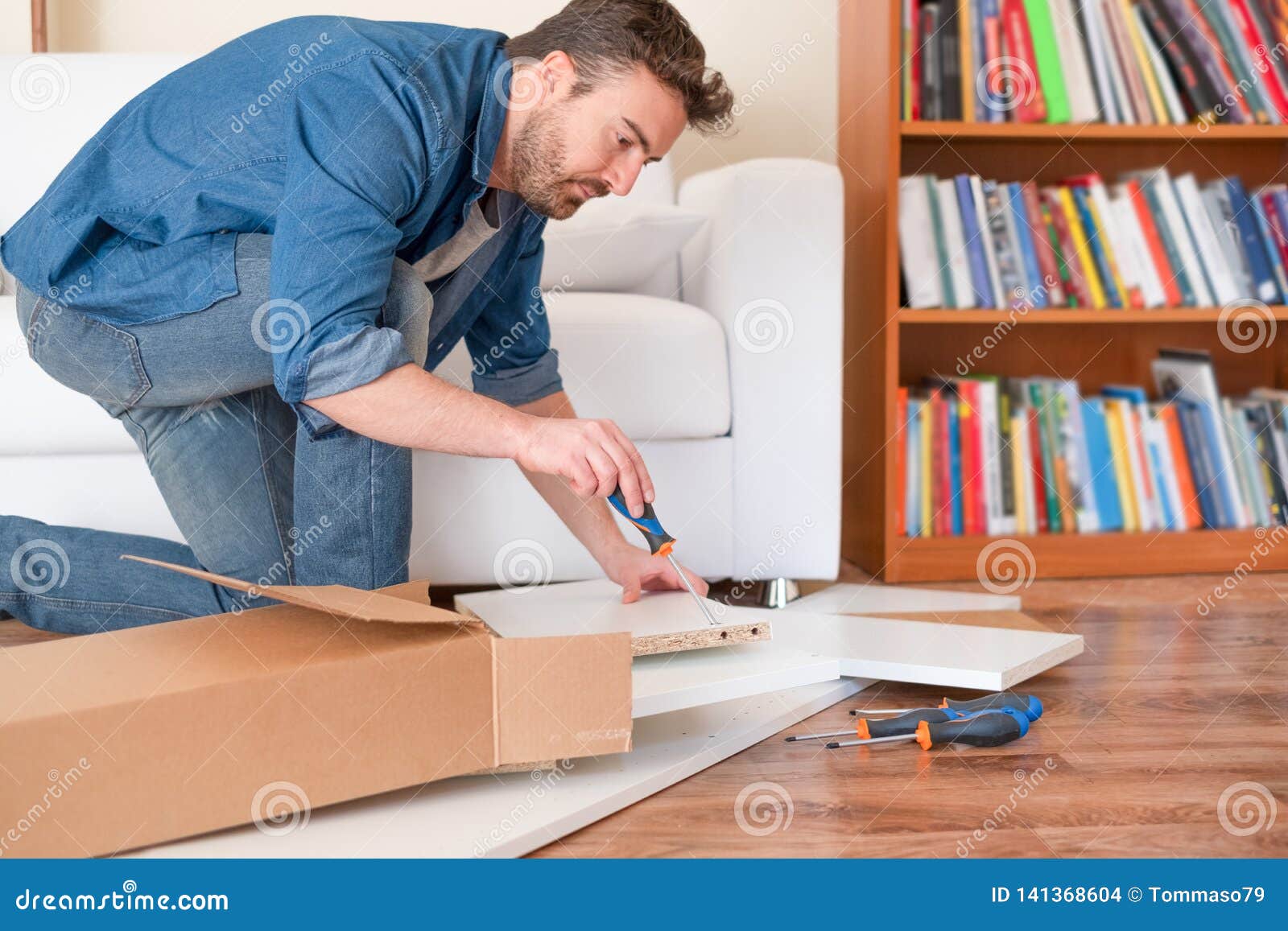 New Home And Man Assembling Furniture Do It Yourself Stock Photo Image Of Carpenter Board