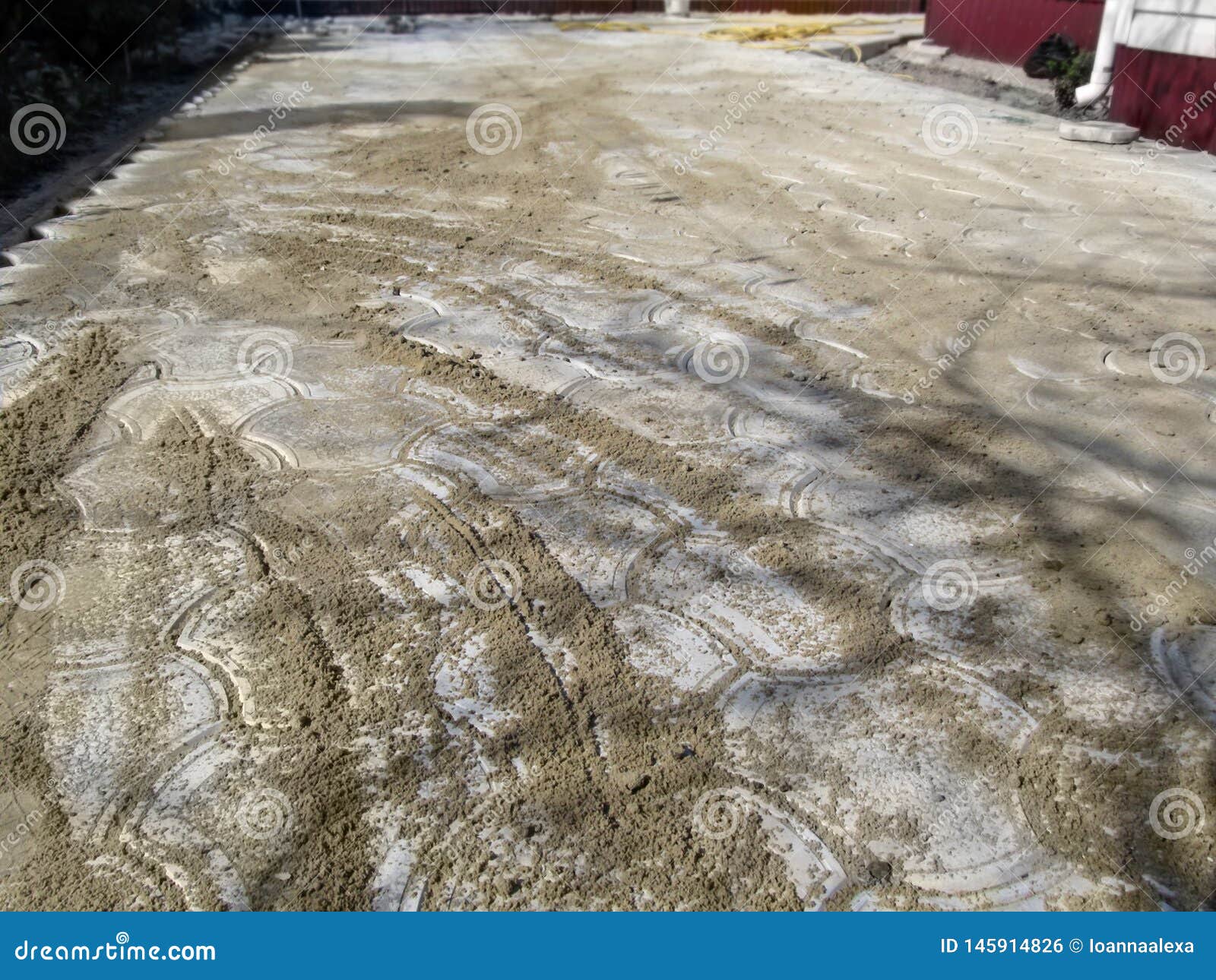 how to lay paving slabs on sand