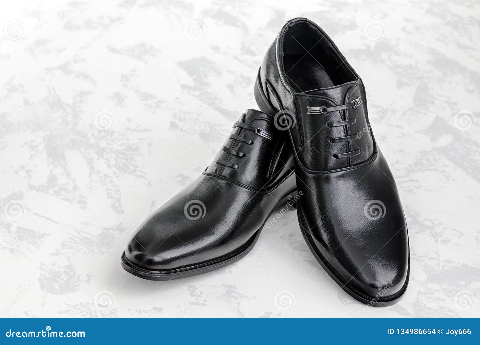 Men`s Shoes Made of Black Leather on a Light Background Stock Photo ...