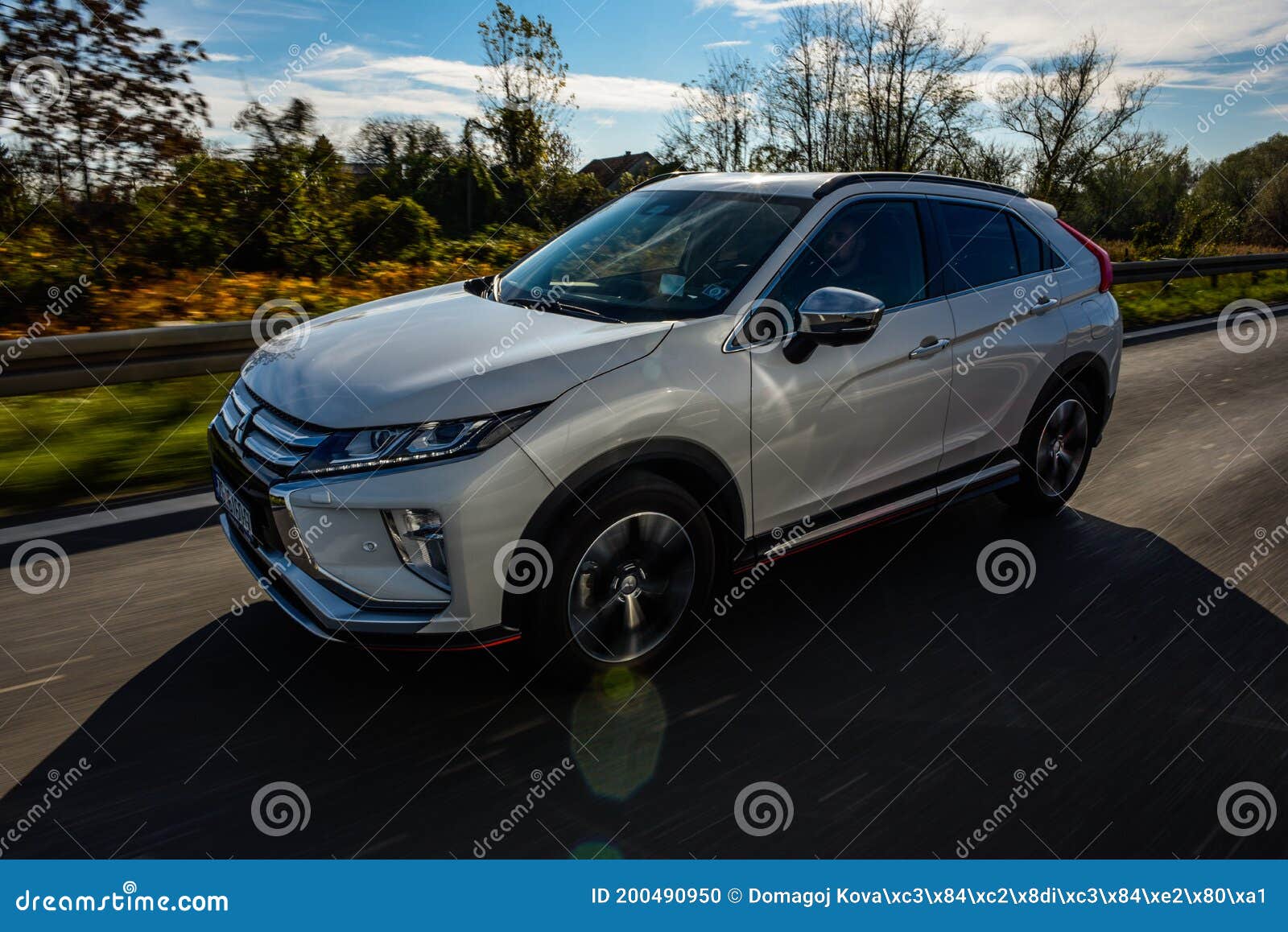 New 2018 Mitsubishi Eclipse Cross in White Colour in Motion. Editorial