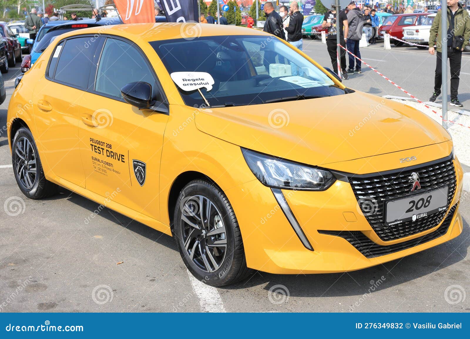 The new Peugeot 208, yellow car 2023