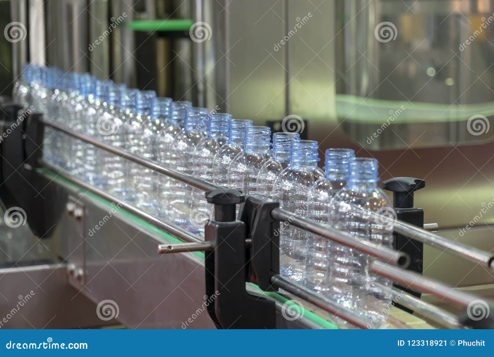 The New Plastic Bottles in the Conveyor Belt Stock Image Image of