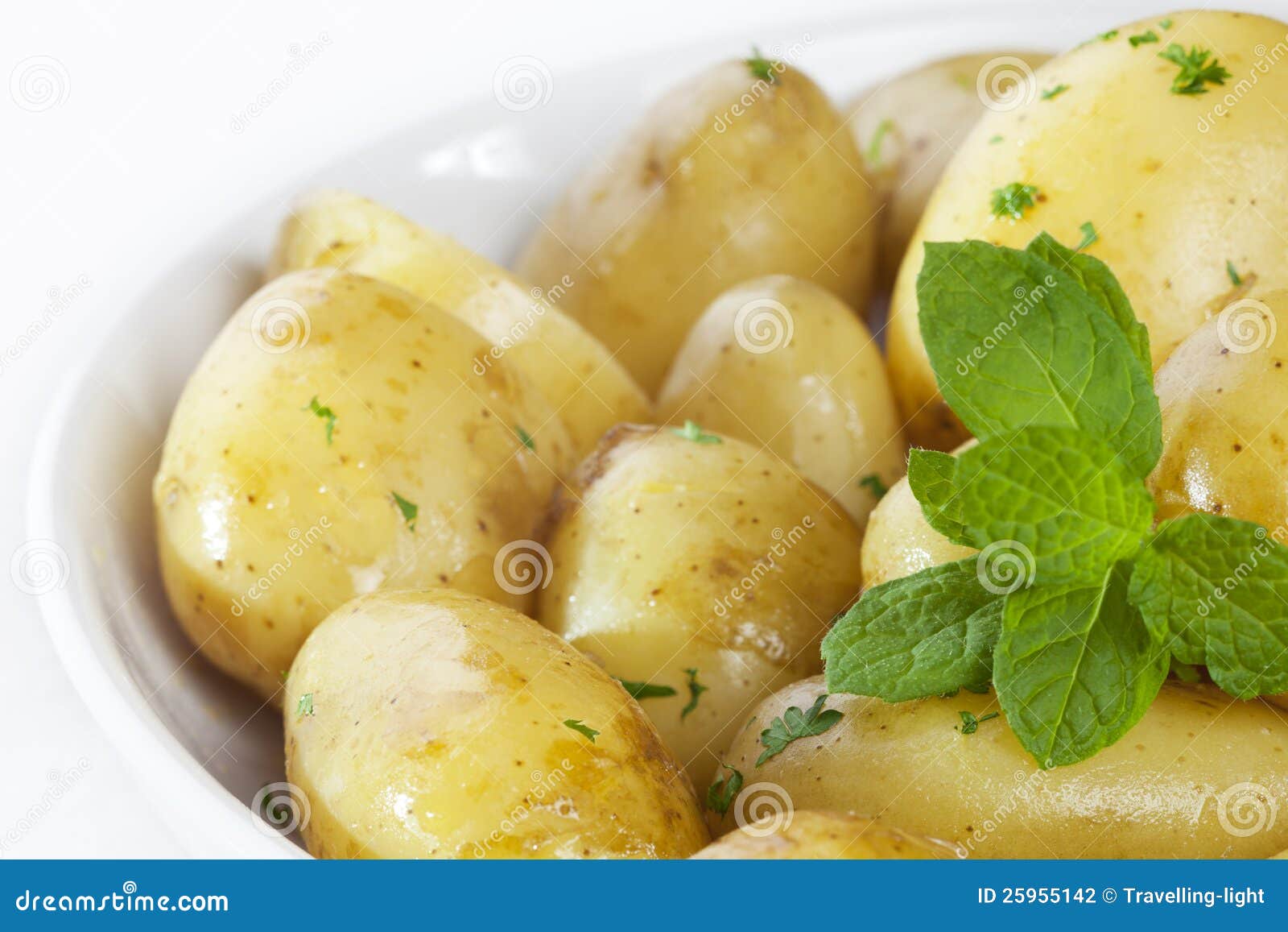 New Potatoes with Butter Parsley and Mint Stock Photo Image of