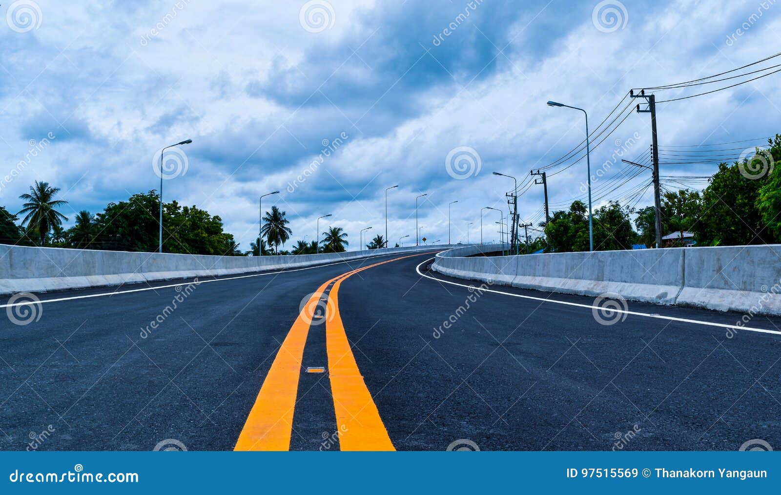 the new road and the bride across the railroad in the countryside of thailand.