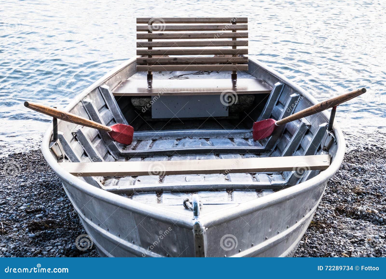 New row boat stock photo. Image of paddle, gray, lake 72289734