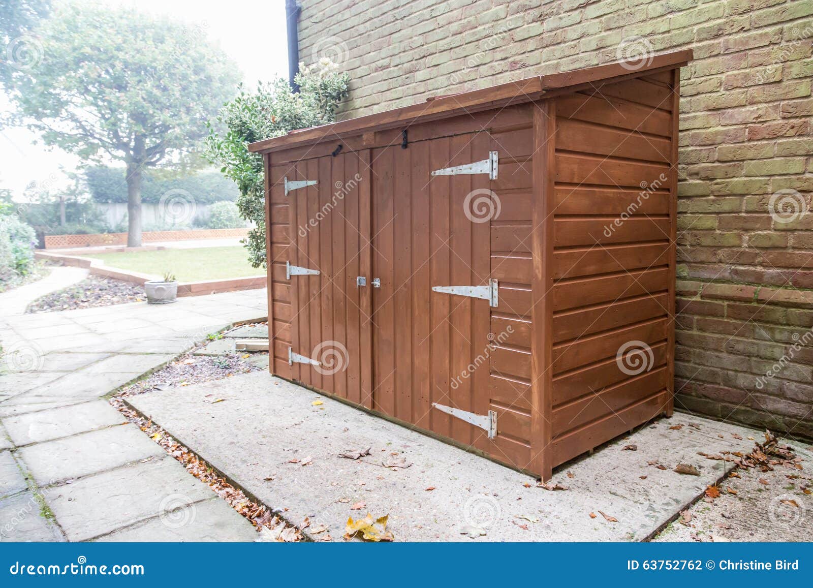 New tool shed in a garden. stock photo. Image of small 