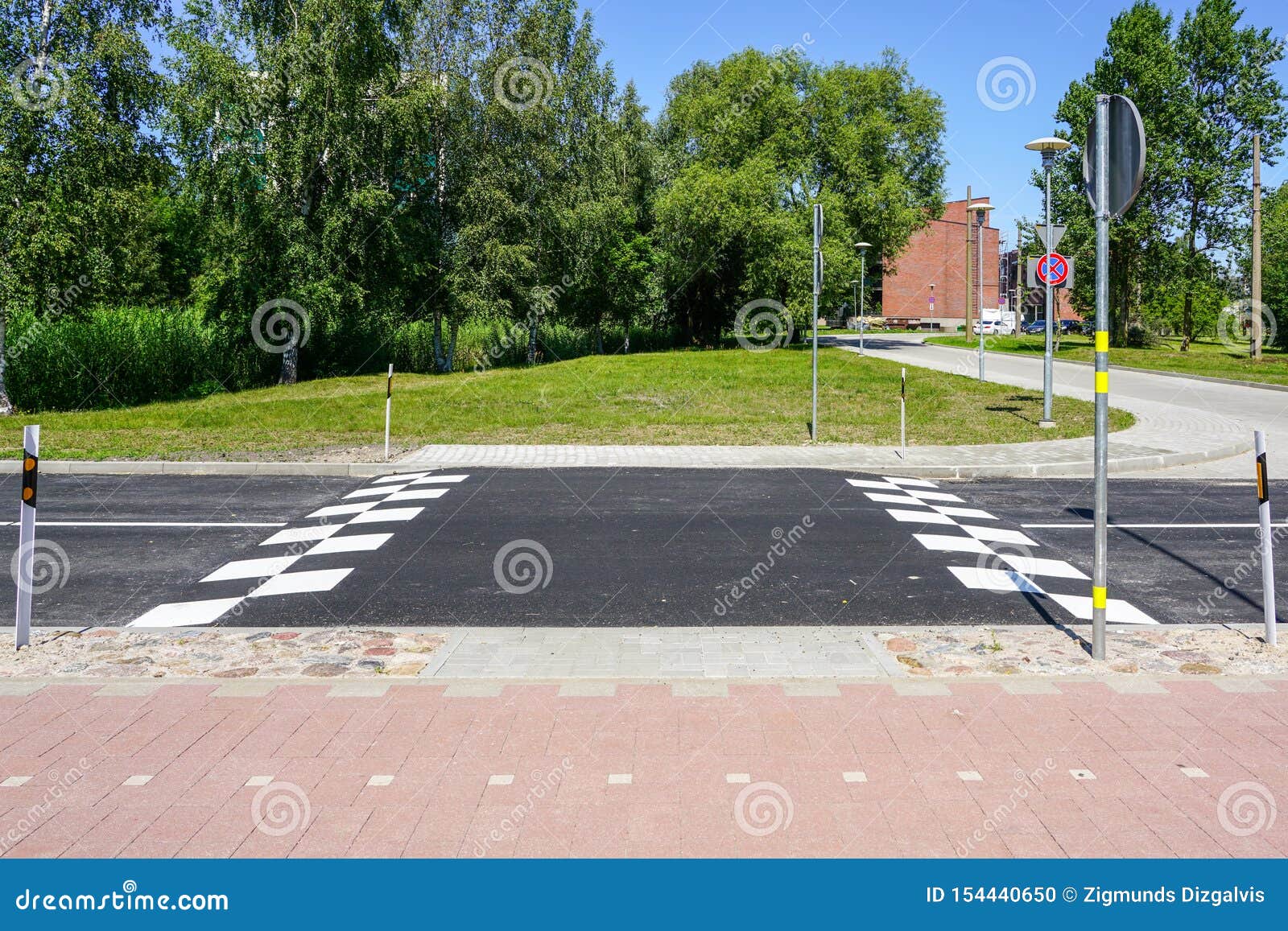 New Traffic Safety Speed Bump on an Asphalt Road Stock Photo - Image of ...