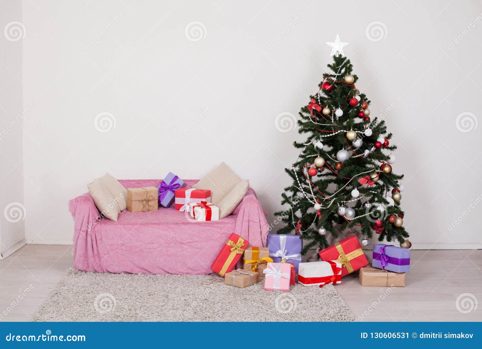 New Year Christmas Decor with Christmas Tree Sofa and Gifts Stock Image