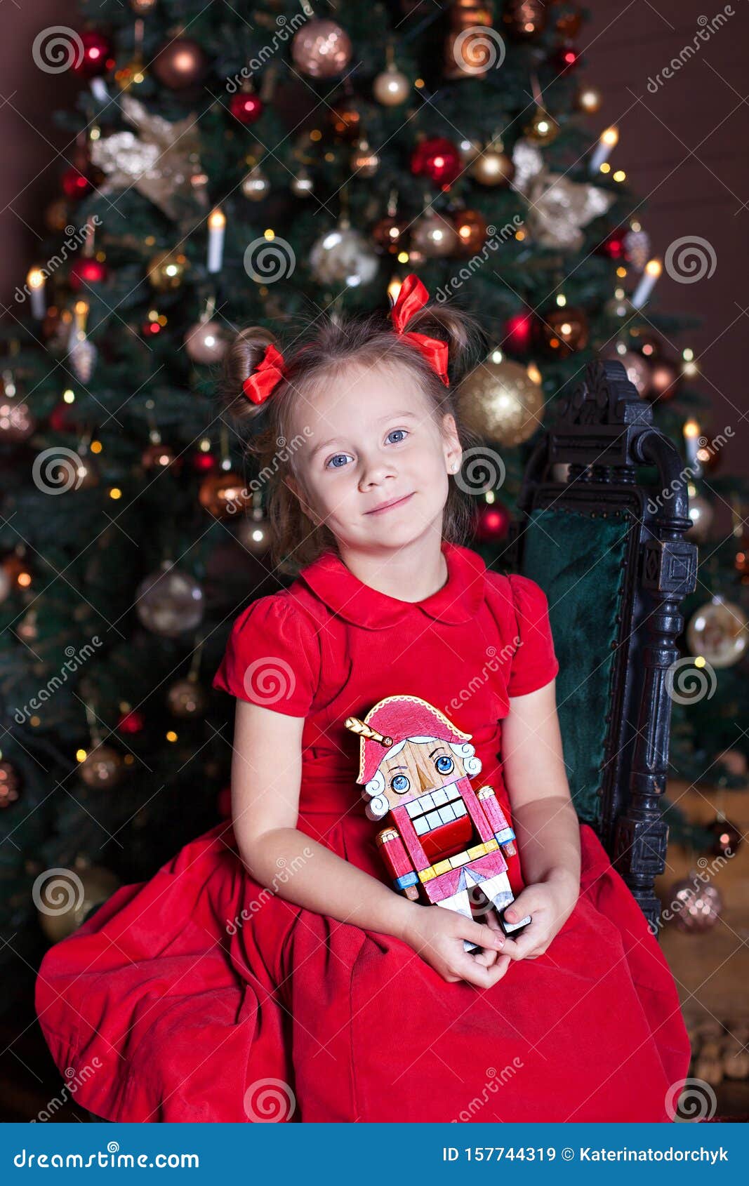 New Year 2020! Merry Christmas, Happy Holidays! An Adorable Little Girl With A Nutcracker In Her ...