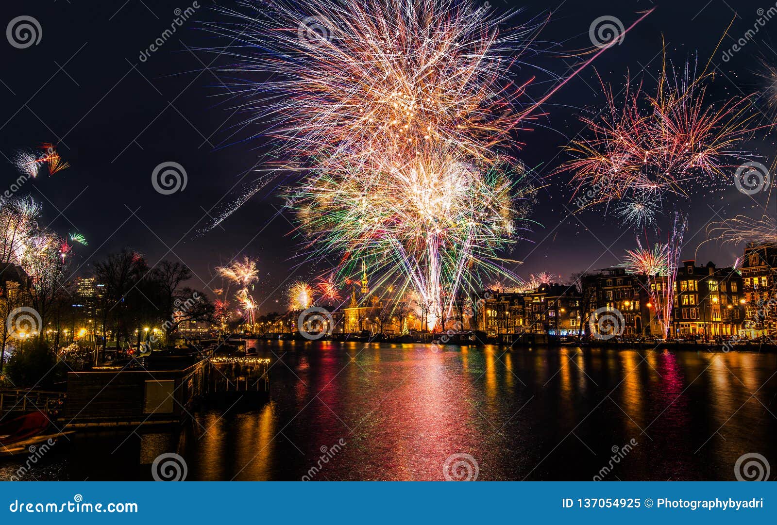 New Year`s Eve Fireworks Over the Amstel River in Amsterdam, North