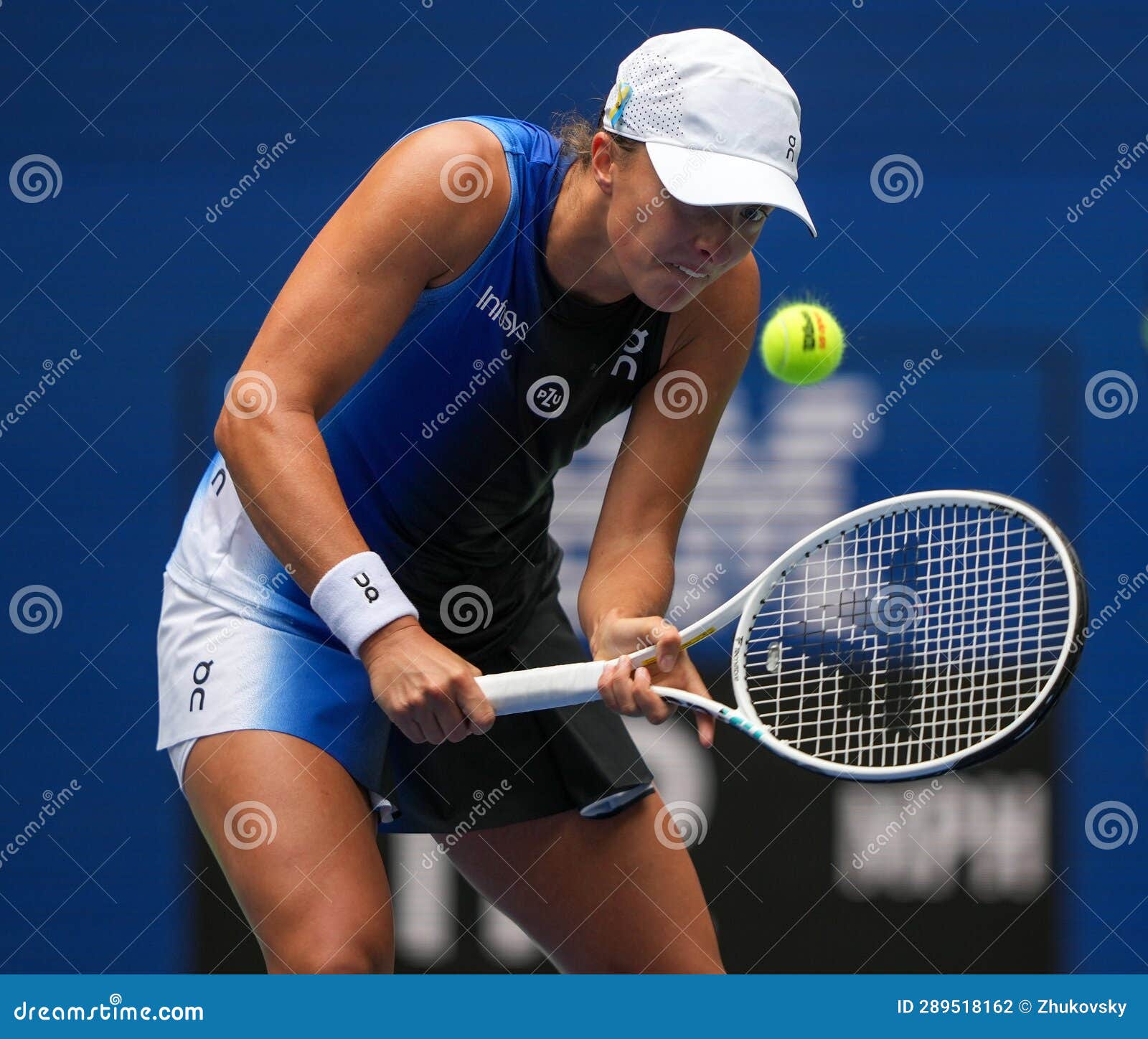 Iga Swiatek of Poland in Action during First Round Match Against Rebecca Peterson of Sweden at the 2023 US Open Editorial Photography