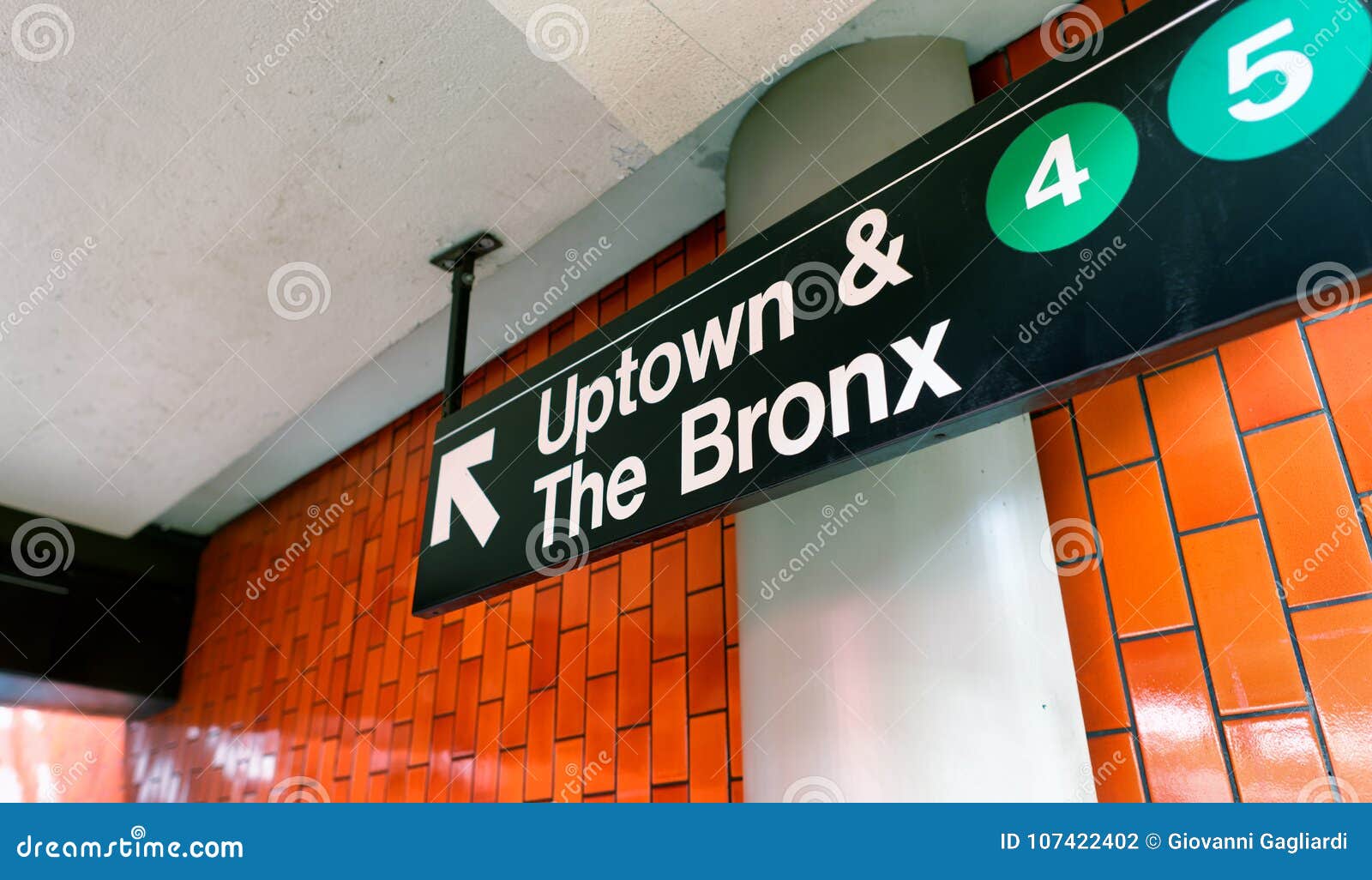 new york city - june 8, 2013: uptown and the bronx station sign.