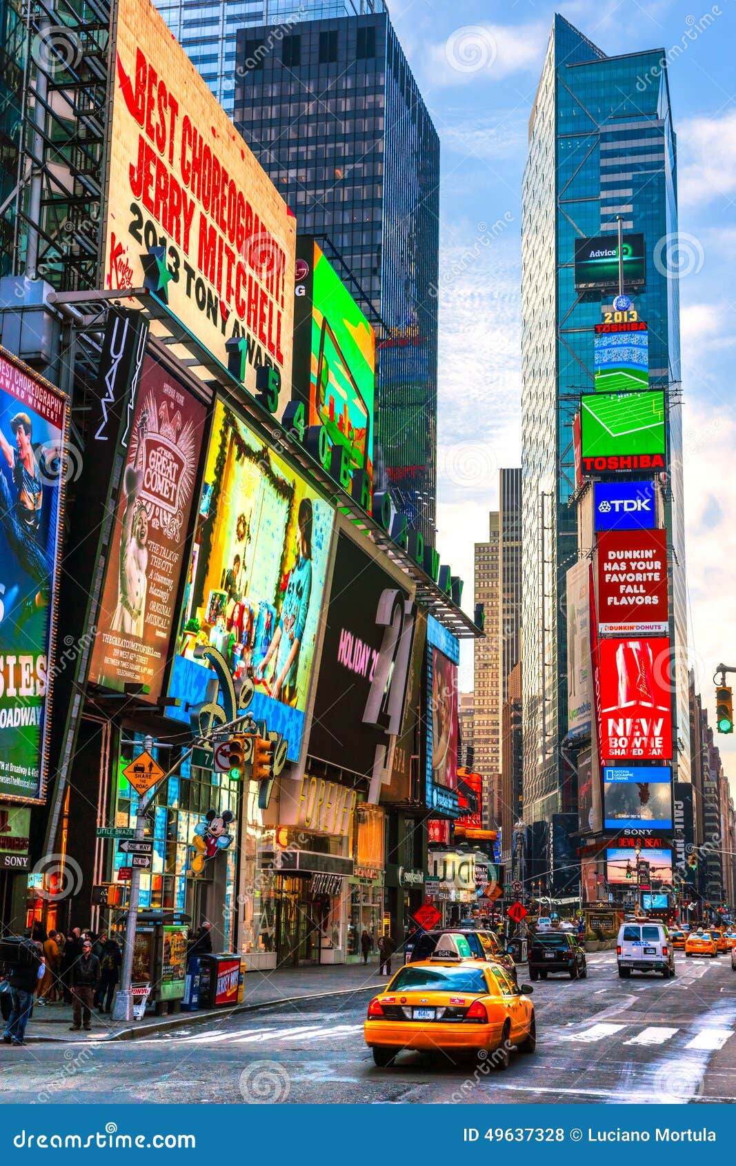 New York times Square broadway view of street showing adverts disney forever  21 twenty one Stock Photo - Alamy