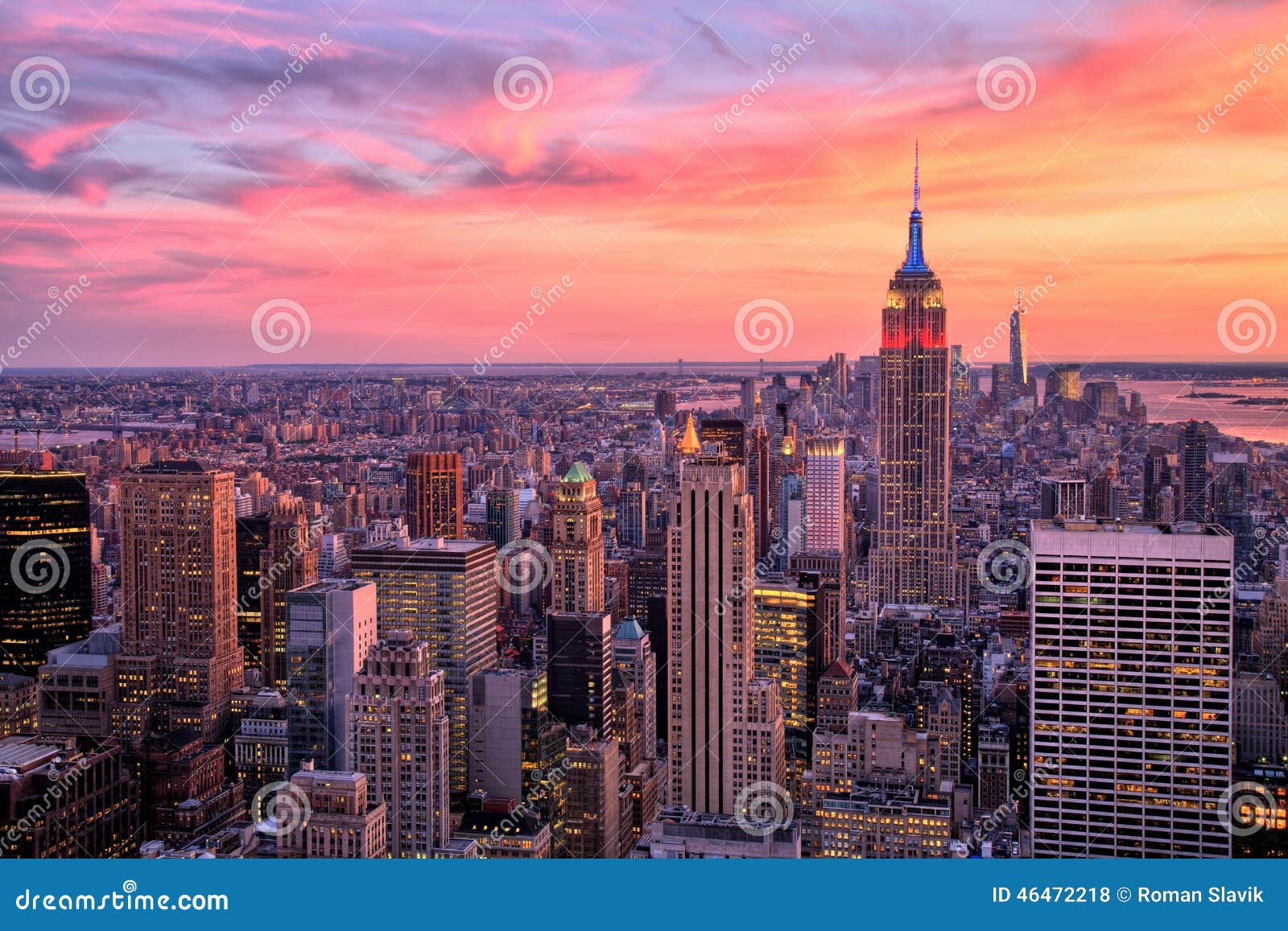 new york city midtown with empire state building at amazing sunset