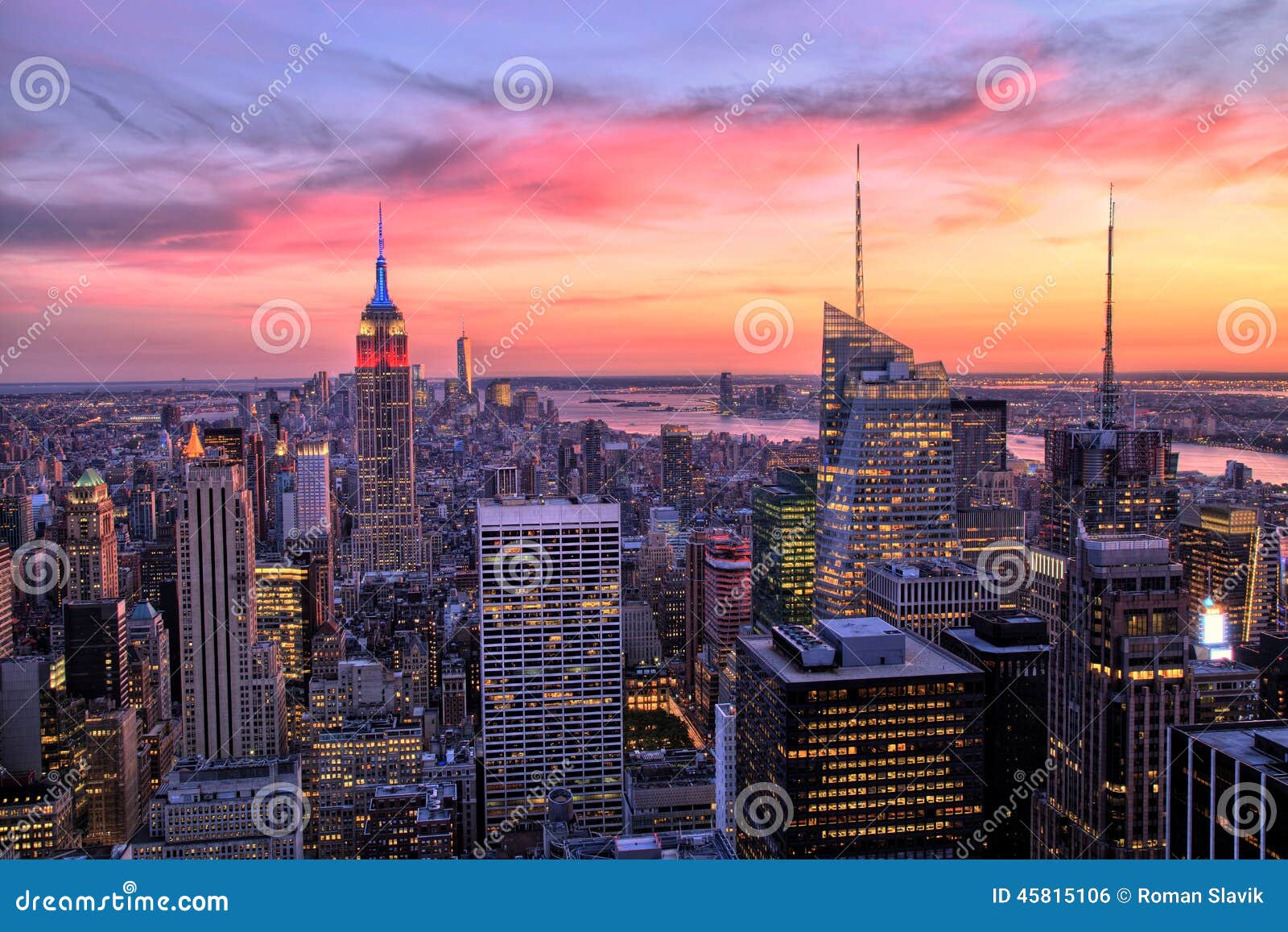 new york city midtown with empire state building at amazing sunset