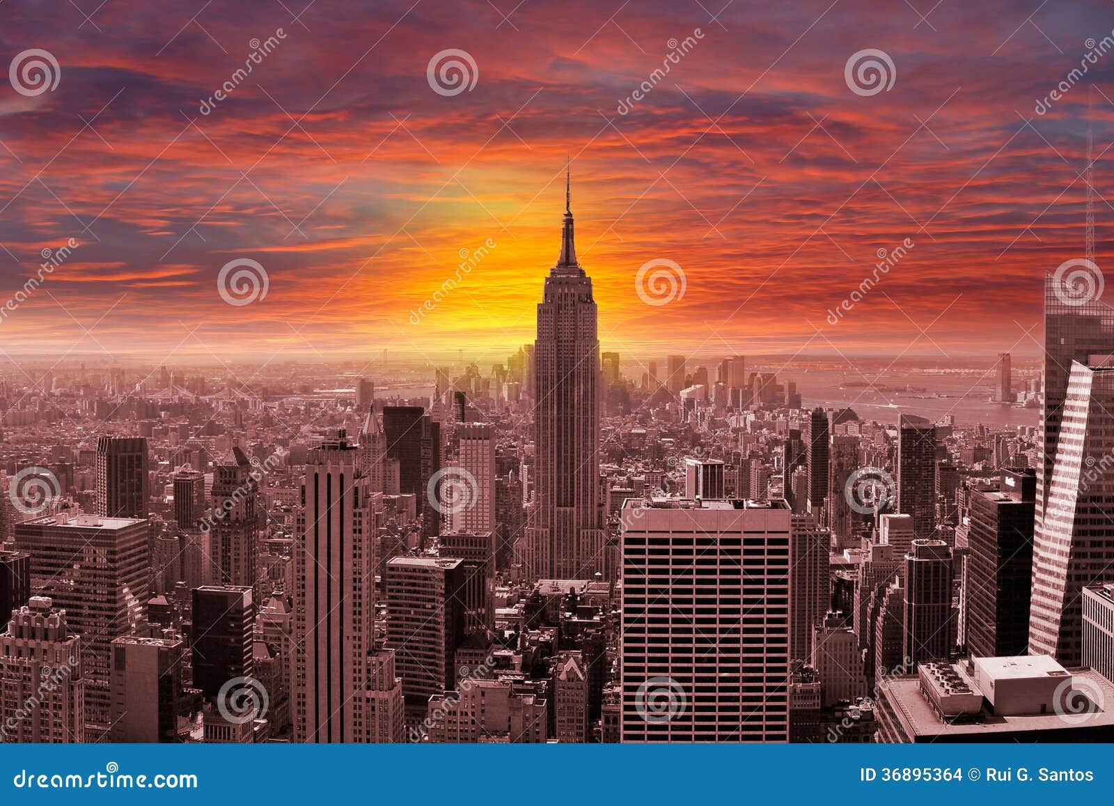 new york city skyline with a sunset