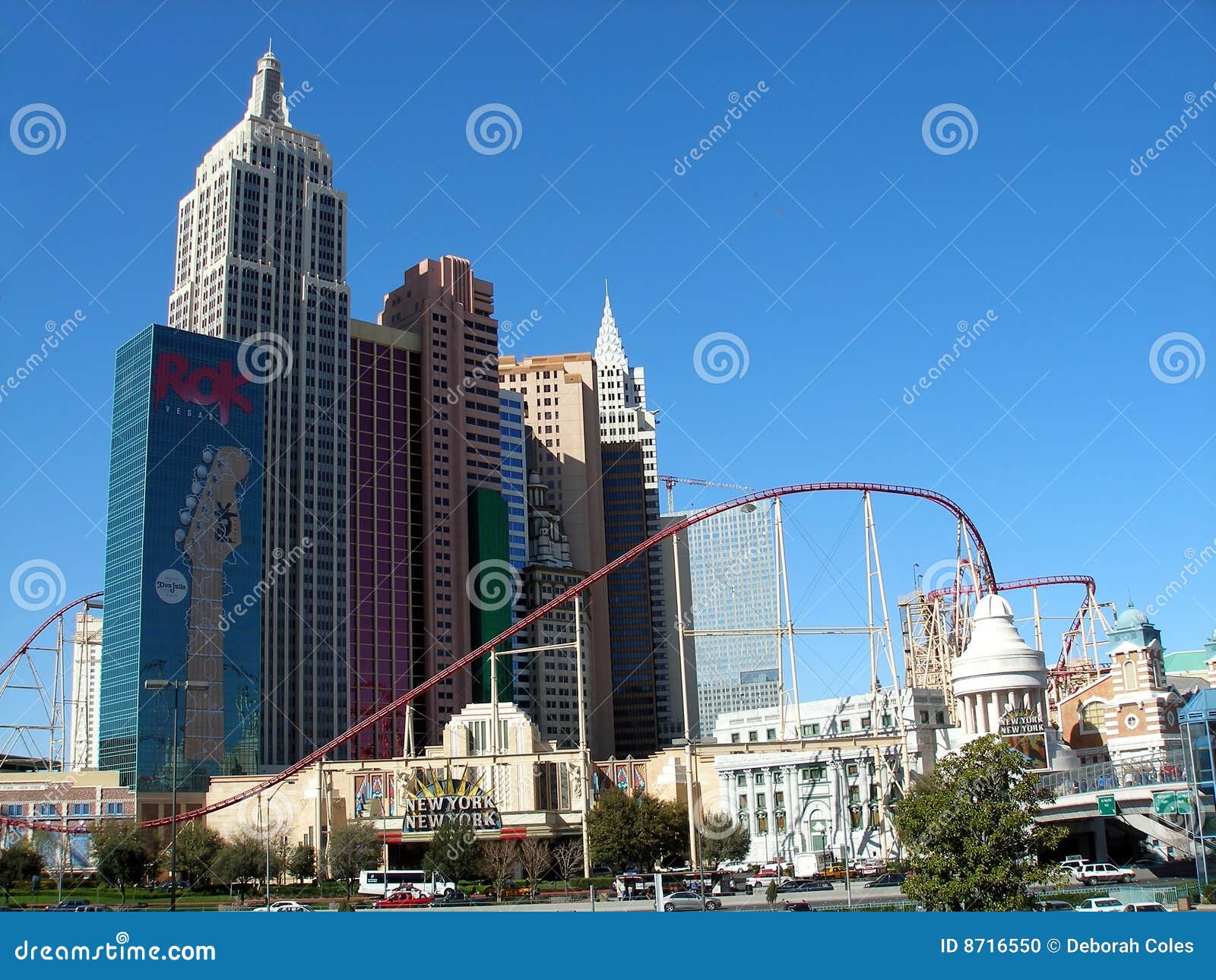 A roller coaster in the middle of a city photo – Free Las vegas strip Image  on Unsplash