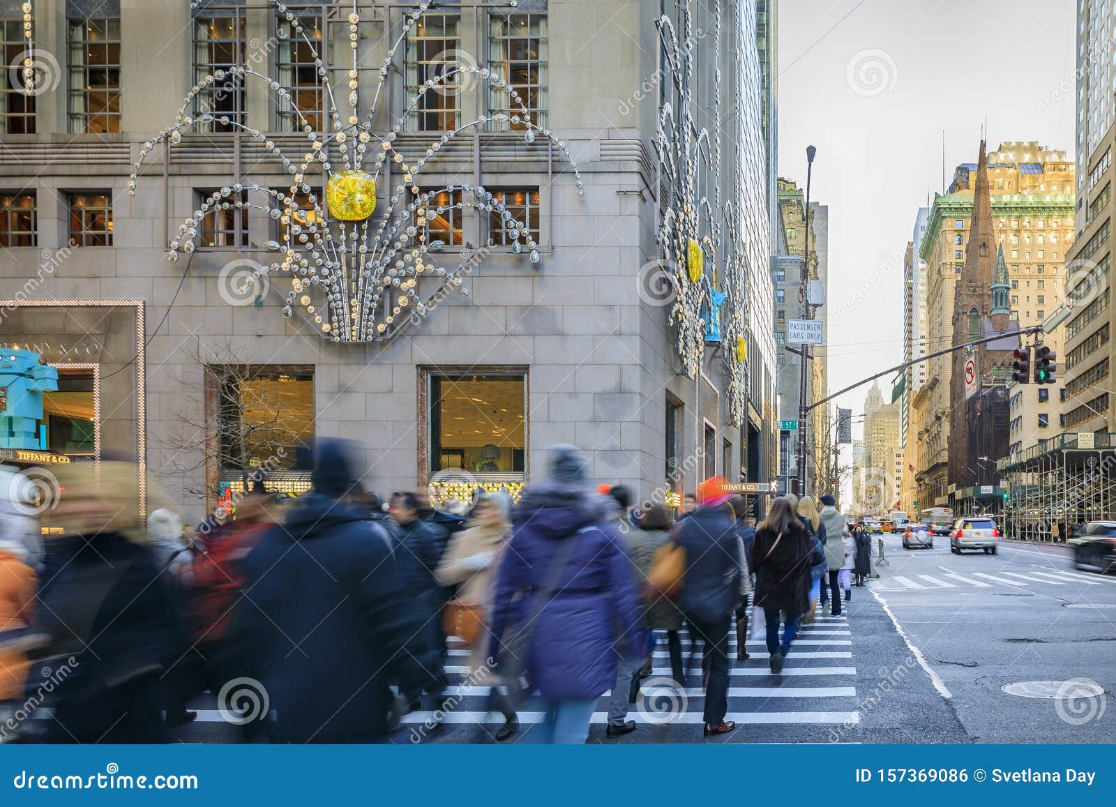 Blurred Yellow Taxi Cabs Speed Past People and Traffic Cop at a ...