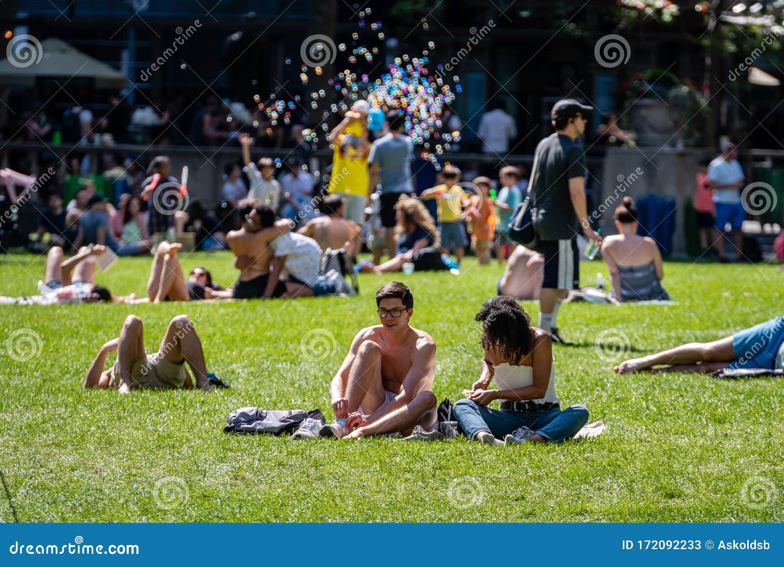 On A Hot Summer Day People Sunbathe In A Park In The City Center New York Usa Editorial Stock
