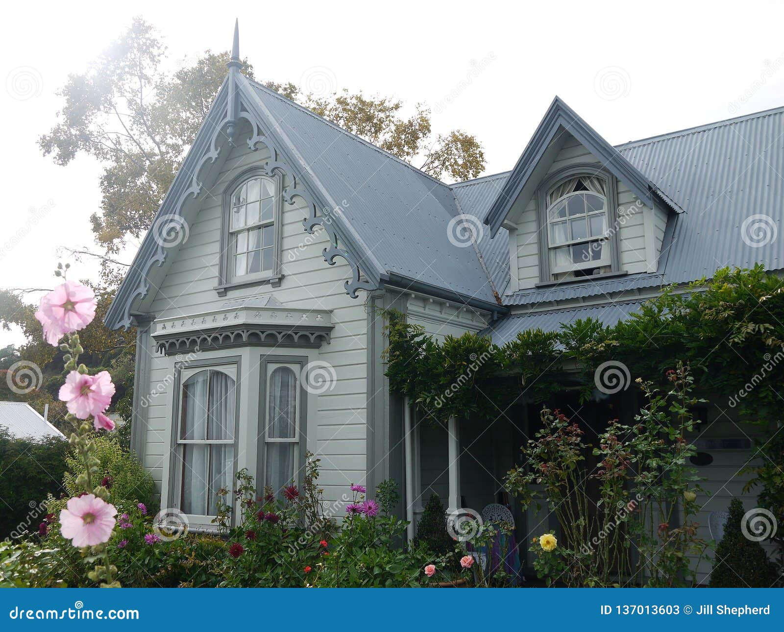 new zealand: akaroa historic 19th century grey house