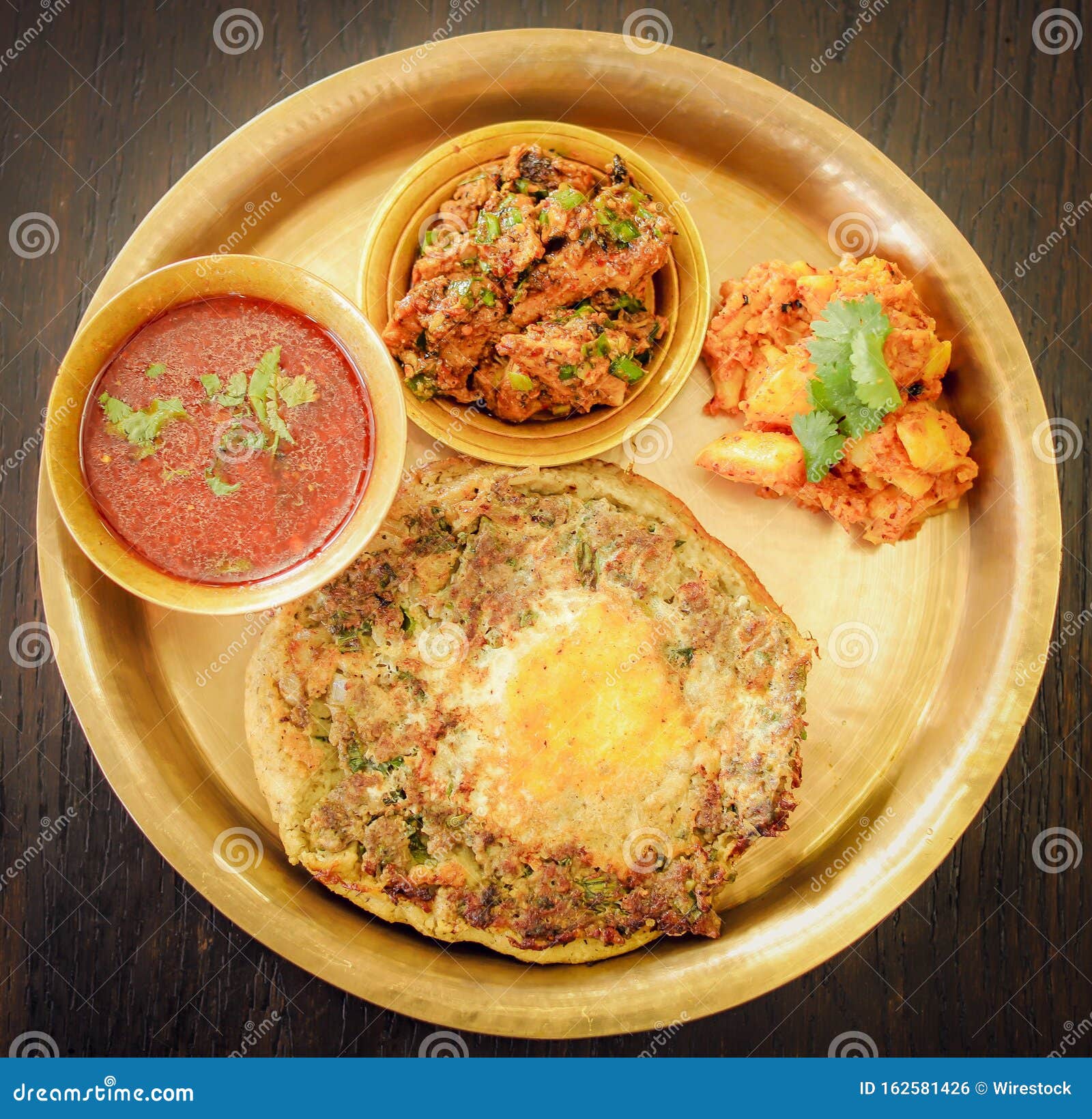 newar food in a tray  on a wooden surface - great for an article about traditional foods