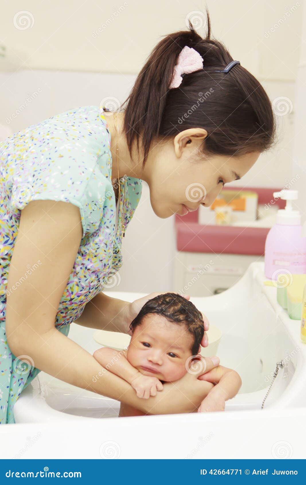 Newborn baby stock image. Image of hold, arms, hugging 42664771