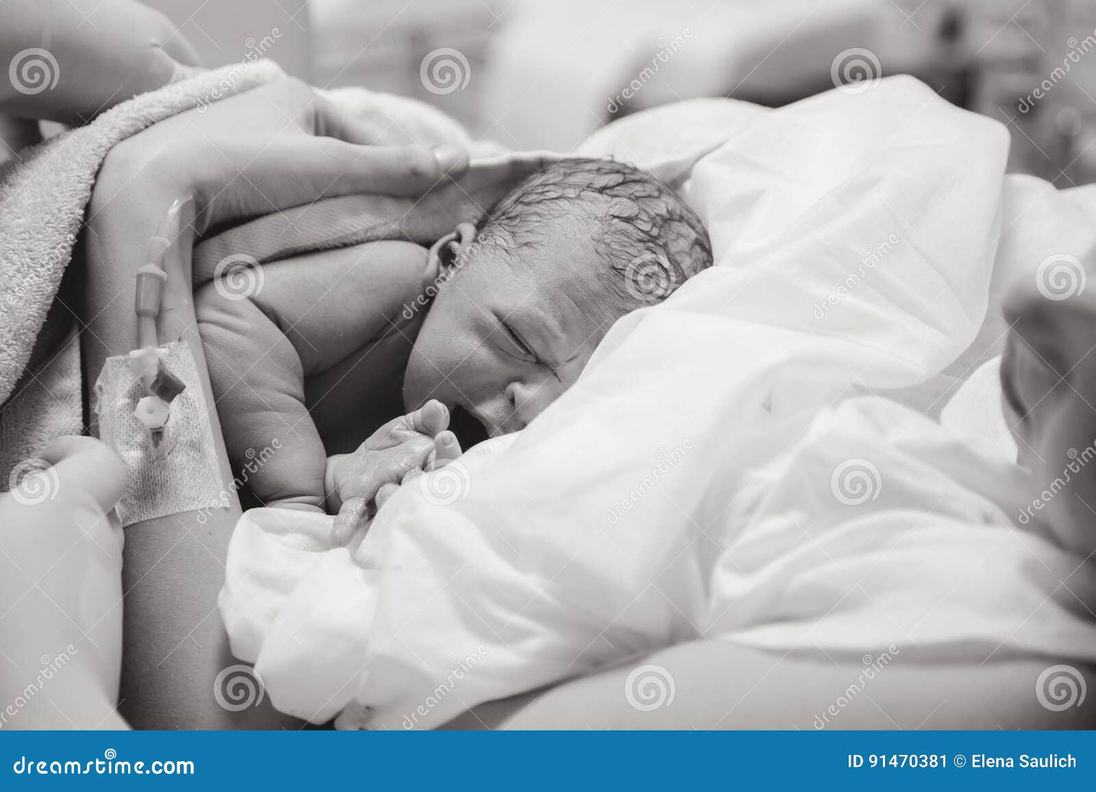 Newborn Baby Lying In Blue Jeans And A Black Scarf by Elena Saulich