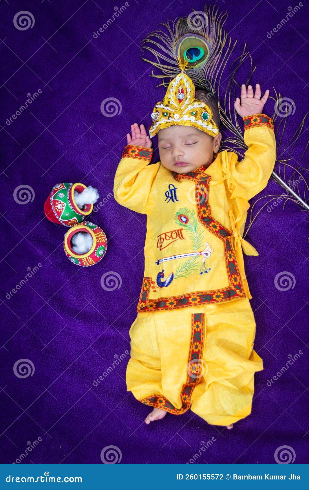 Newborn Baby Boy in Krishna Dressed with Props from Unique Perspective