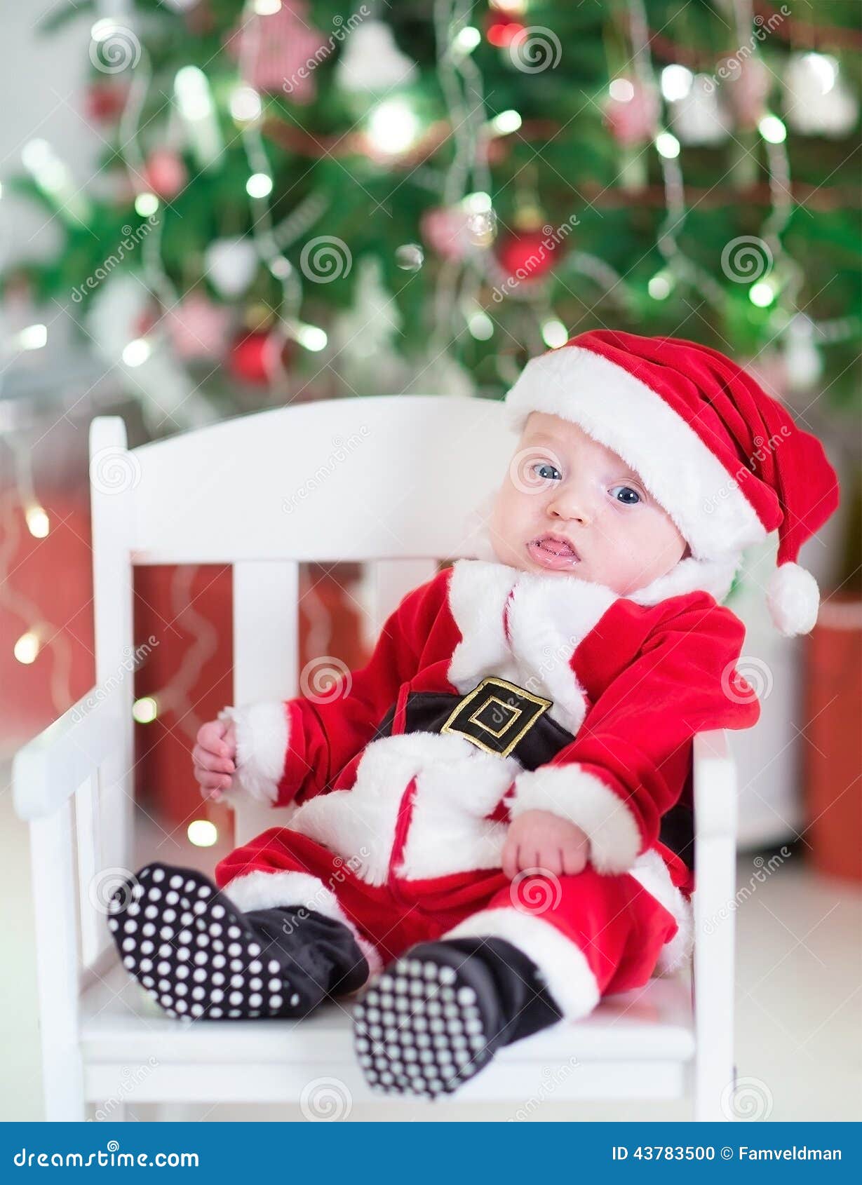 Newborn Baby Boy in Santa Outfit Sitting Under Chr Stock Photo - Image of  holiday, claus: 43783500