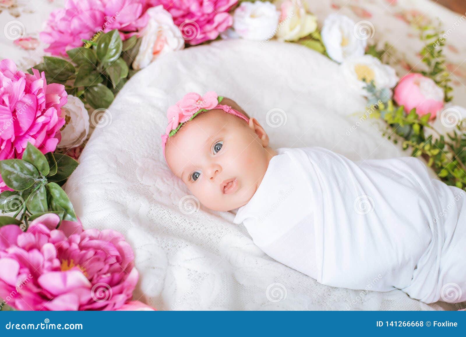 baby in a flower