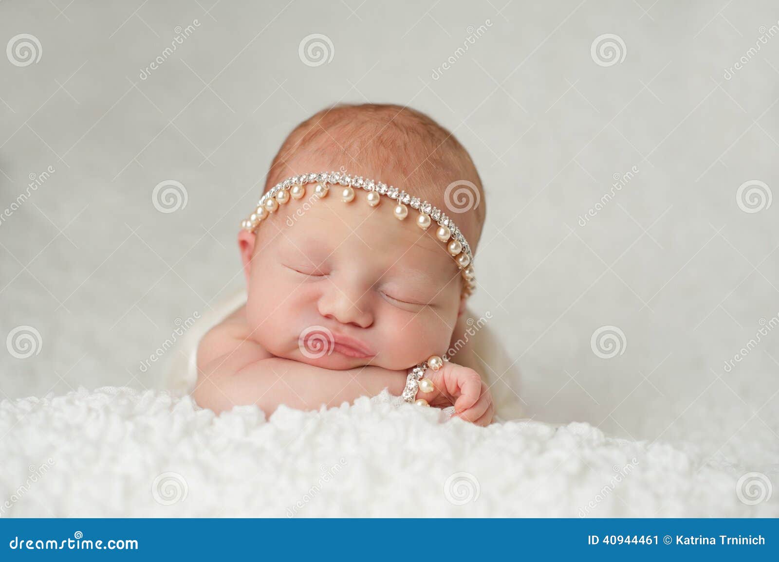 newborn baby girl with rhinestone and pearl headband
