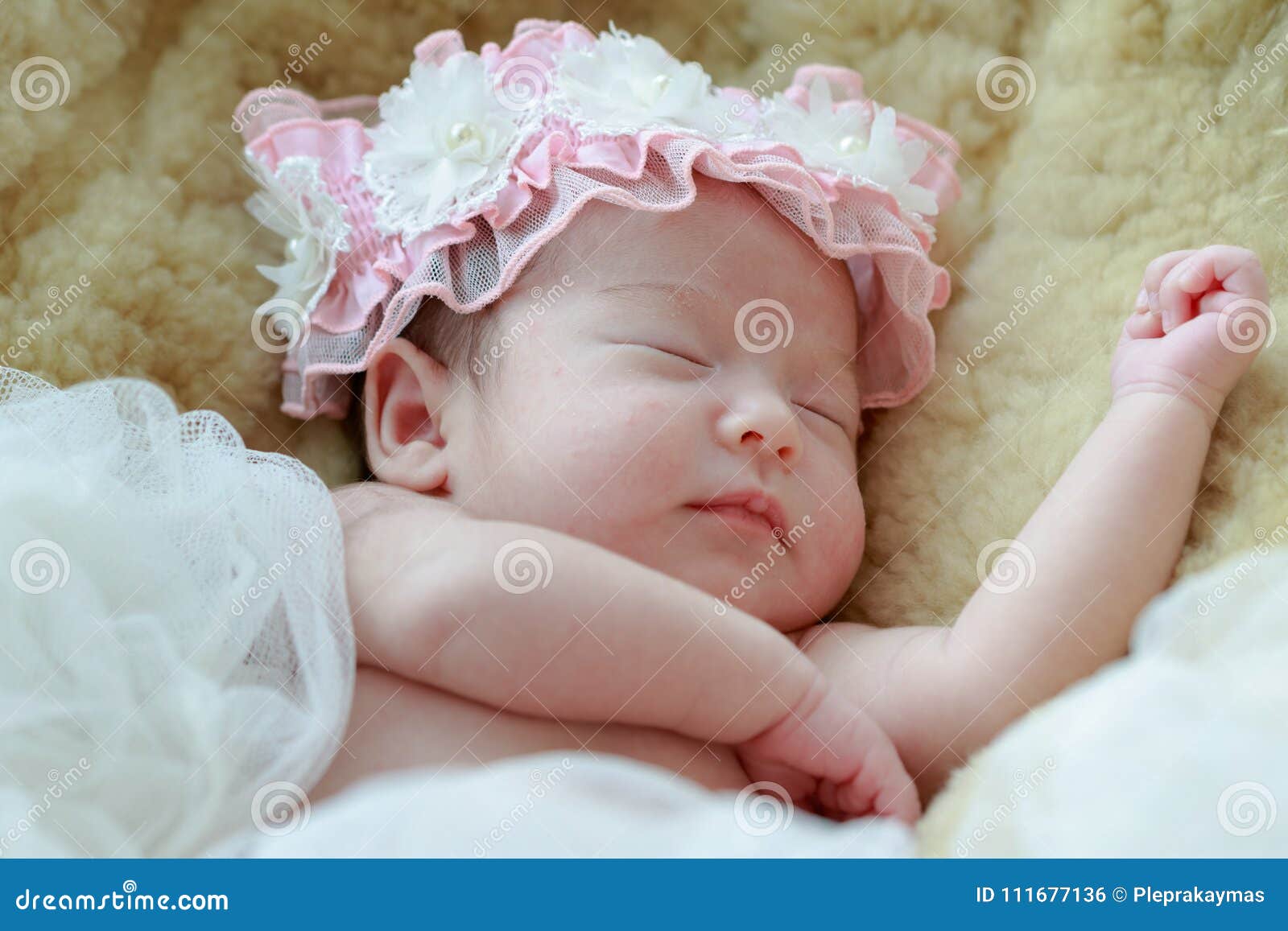 Newborn Baby Girl Smiling in a Dream ,Newborn Baby Girl is Sleep Stock