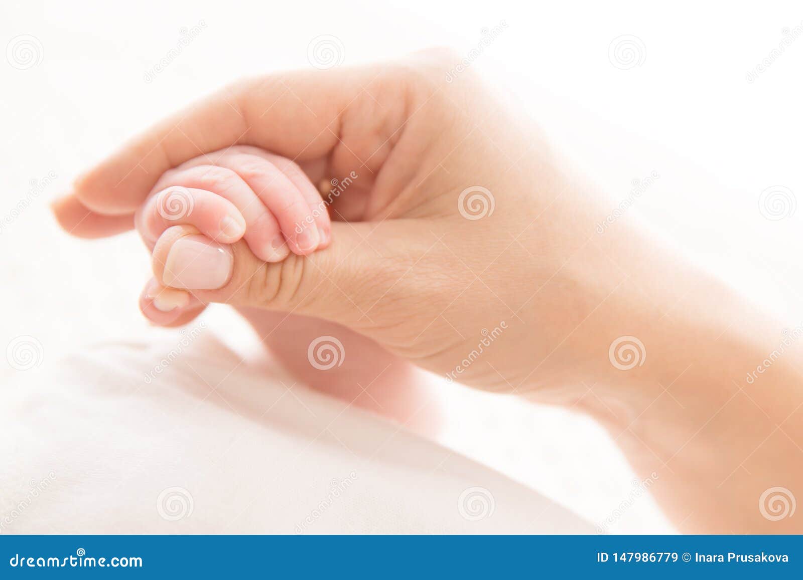 newborn baby hand holding mother, mom hold new born kid