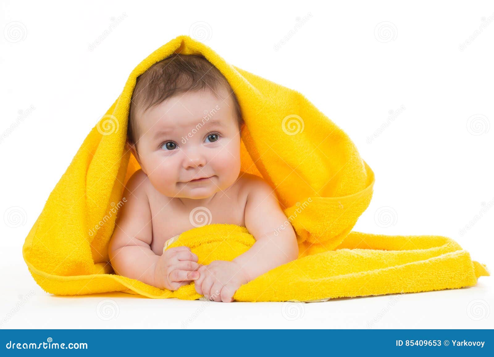Newborn Baby Lying Down and Smiling in a Yellow Towel Stock Image ...