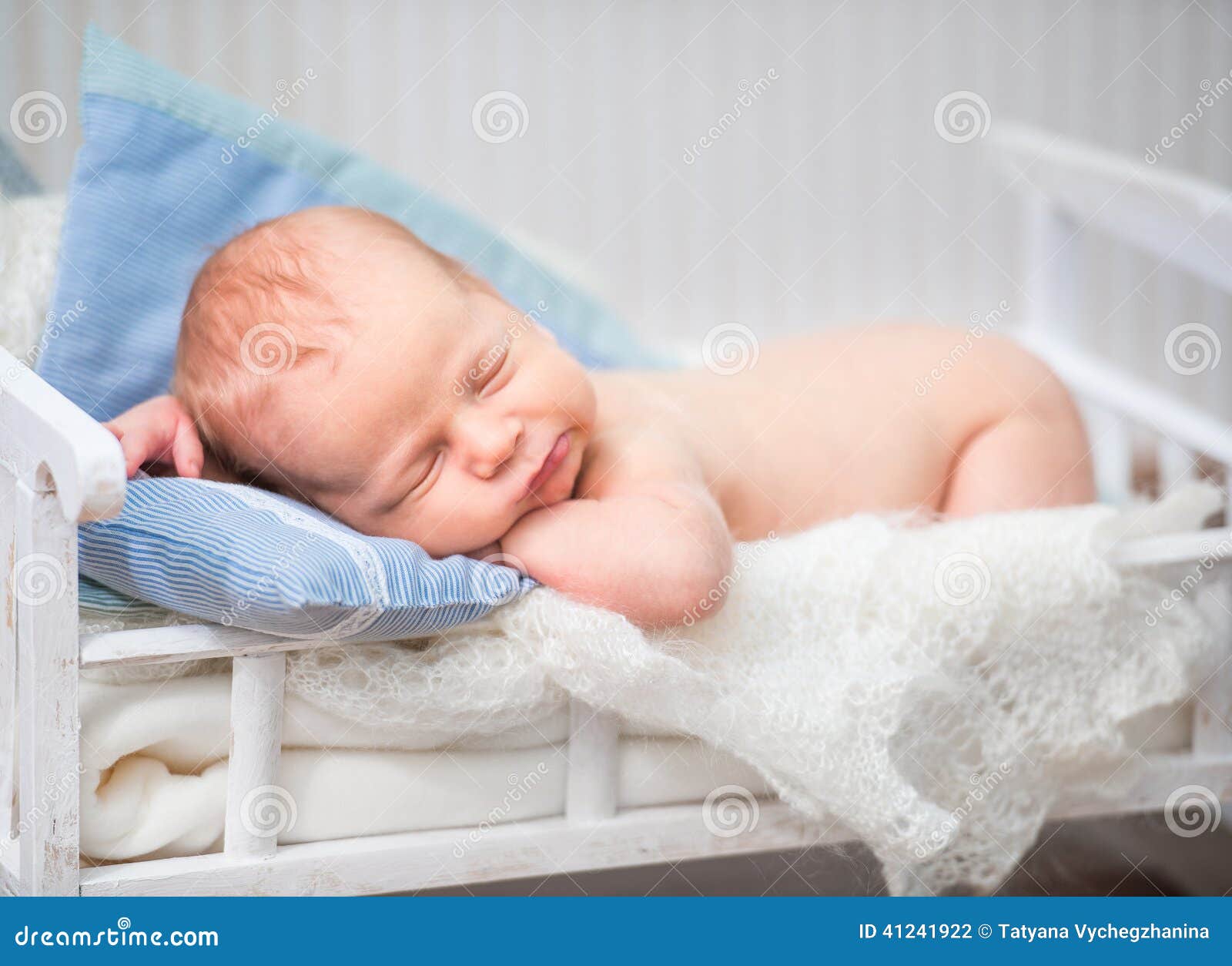 Newborn Baby in a Small Bed Stock Photo Image of little, head 41241922