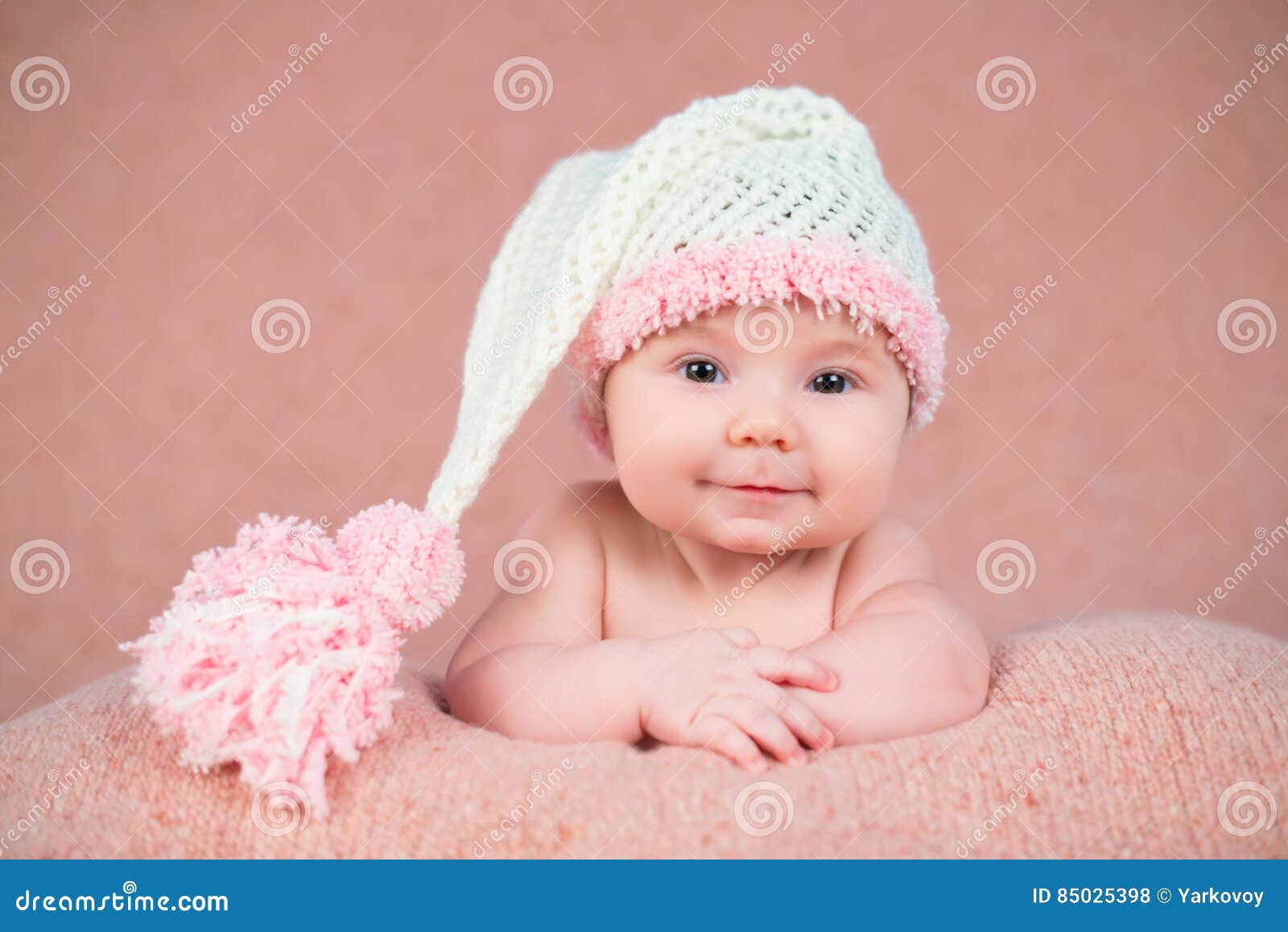 Newborn Baby in a Warm Knitted Hat. Stock Photo Image of joyful