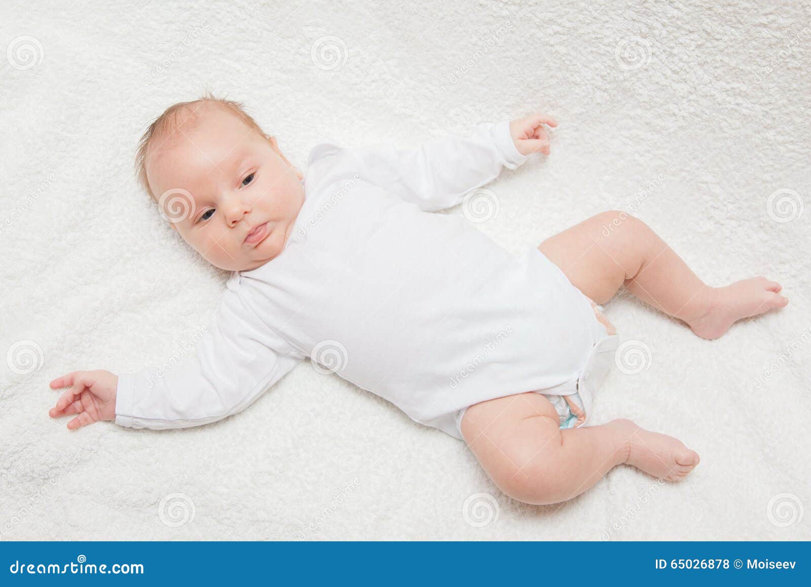newborn baby in white romper