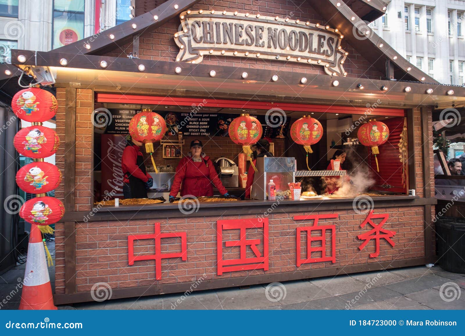 Street Food Vendor Kiosk Selling Hot Cooked Chinese Noodles Food In The