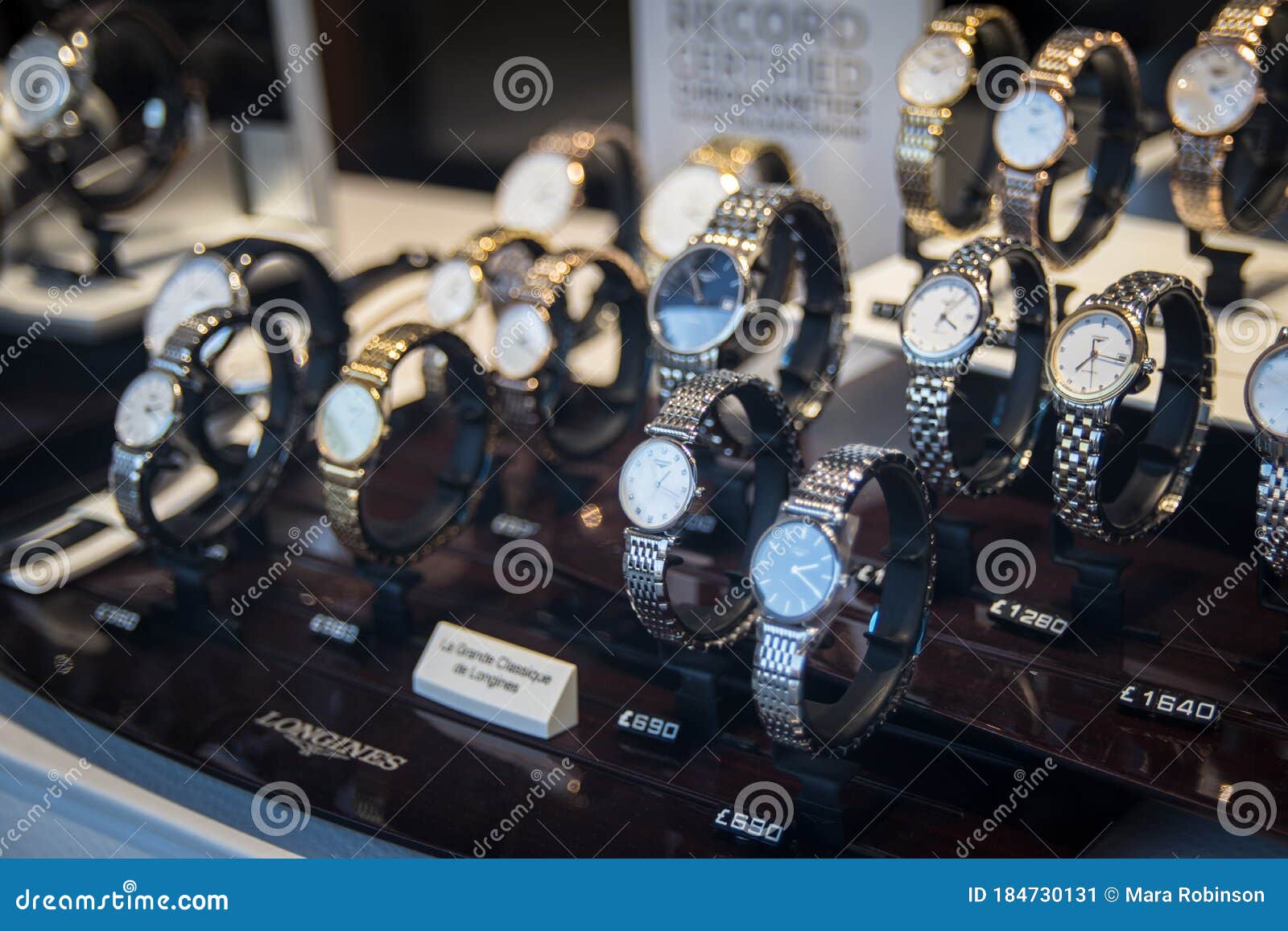 Window Display of Luxury Watches for Sale in High Street Shop Editorial ...