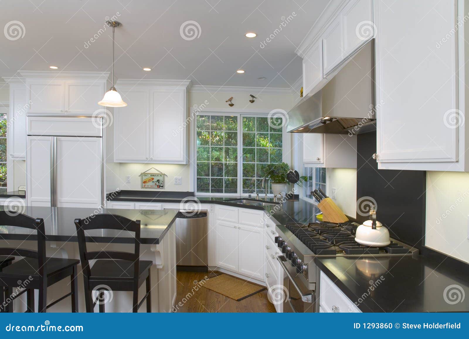 Newly Remodeled White Kitchen Stock Photo - Image of cook, saute: 1293860