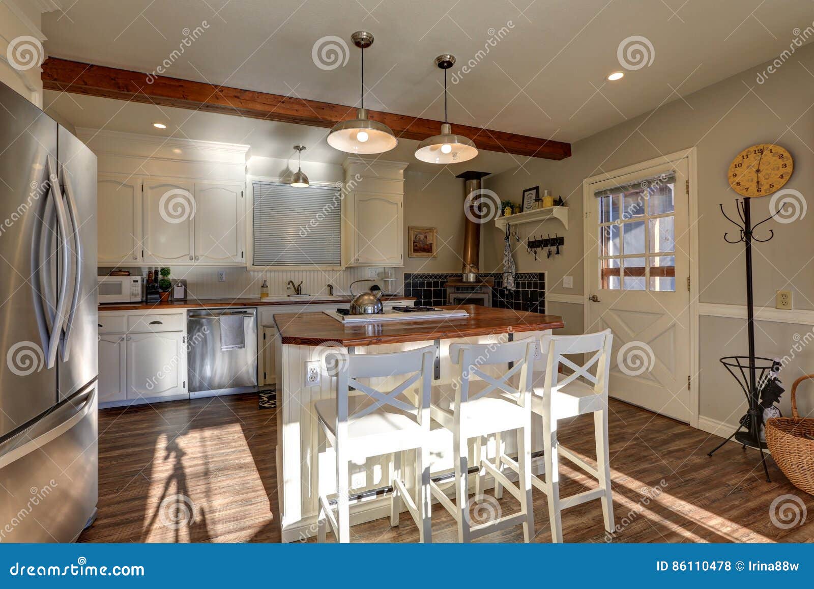 Newly Renovated Kitchen Boasts Wood Beams On Ceiling Stock