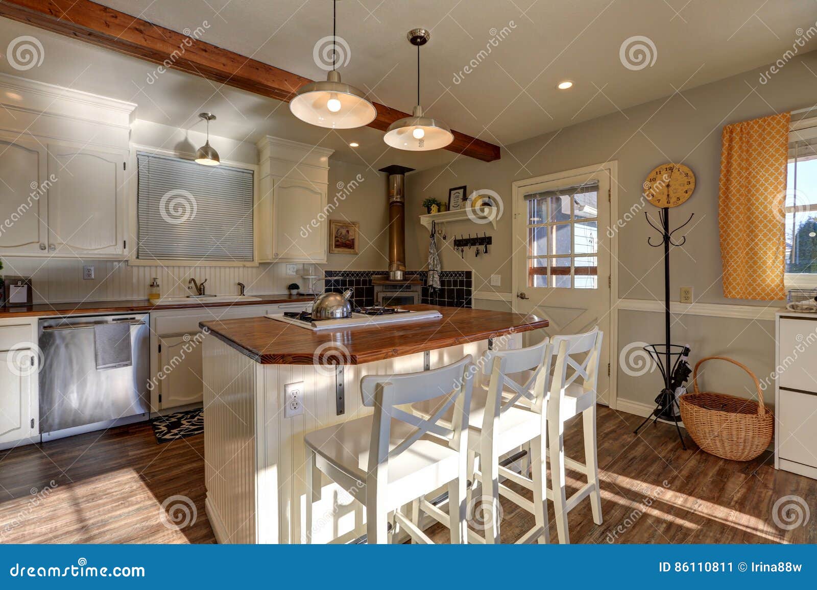 Newly Renovated Kitchen Boasts Wood Beams On Ceiling Stock