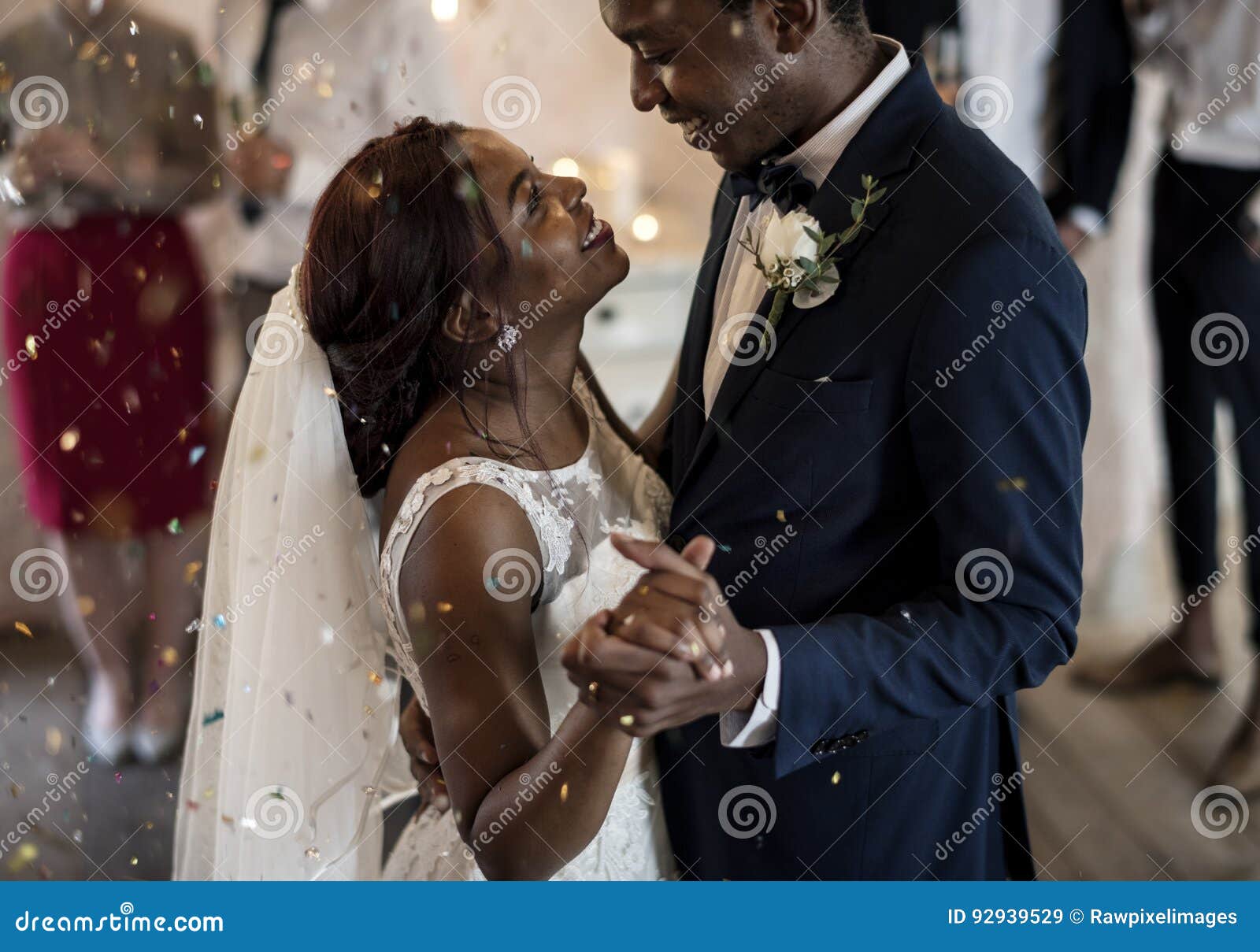newlywed african descent couple dancing wedding celebration