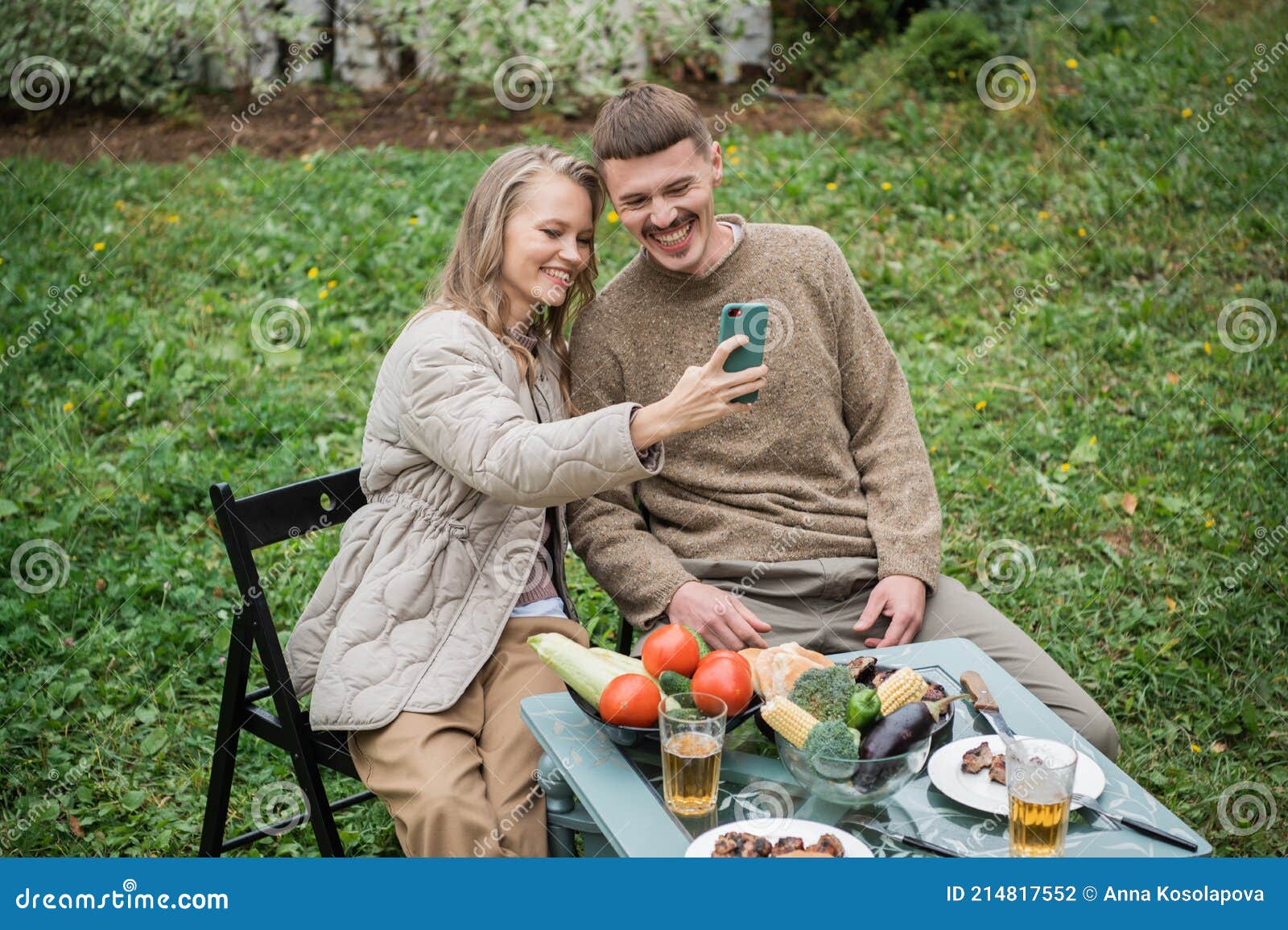 Newlyweds Fool Around At A Picnic In The Backyard Take A Selfie On