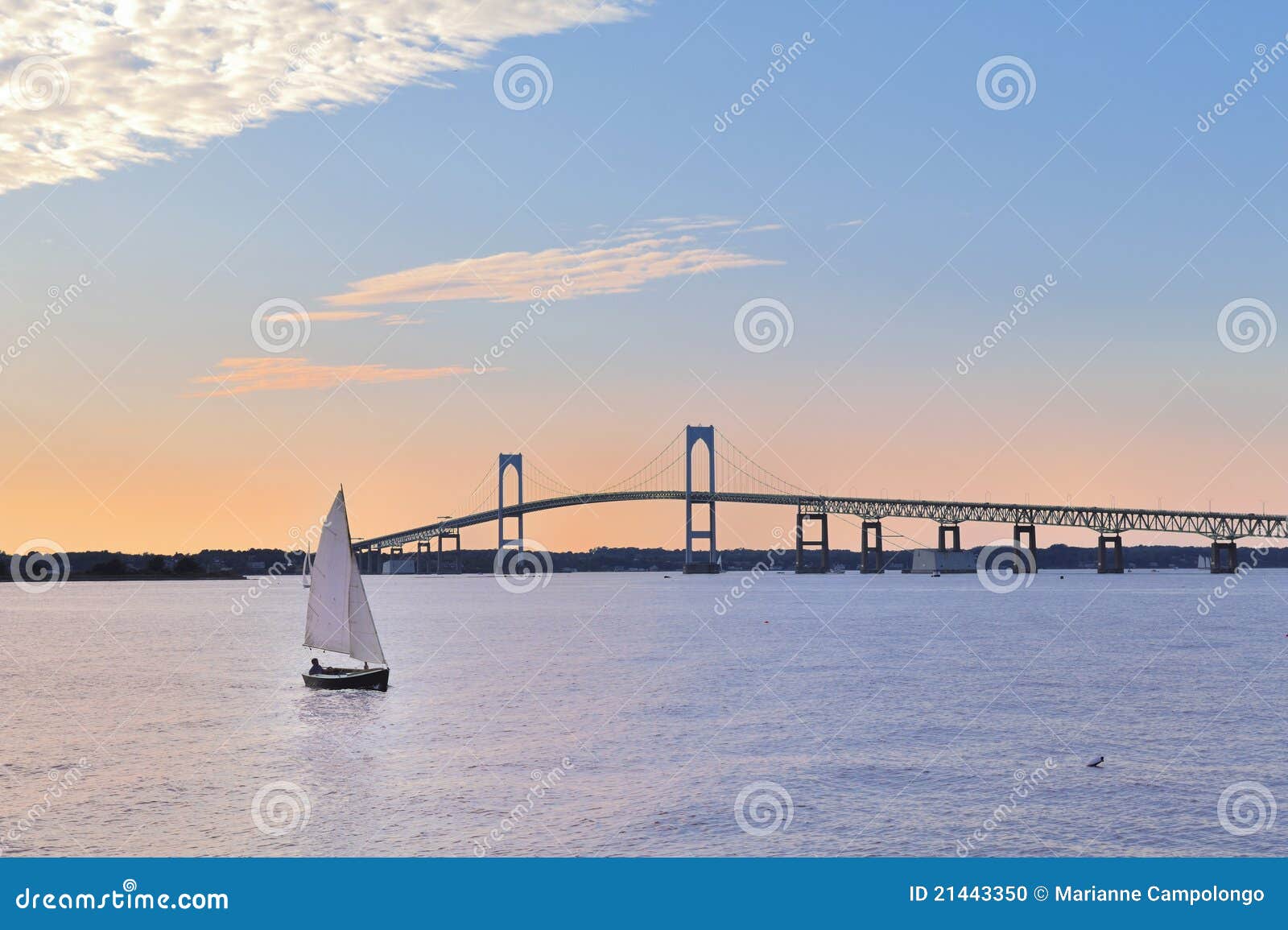newport bridge sailboat at twilight rhode island