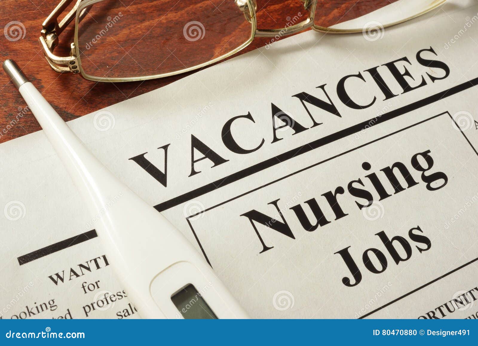 newspaper with ads nursing jobs vacancy.