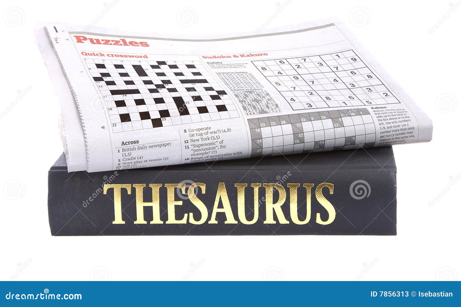 newspaper crossword on top of a thesaurus