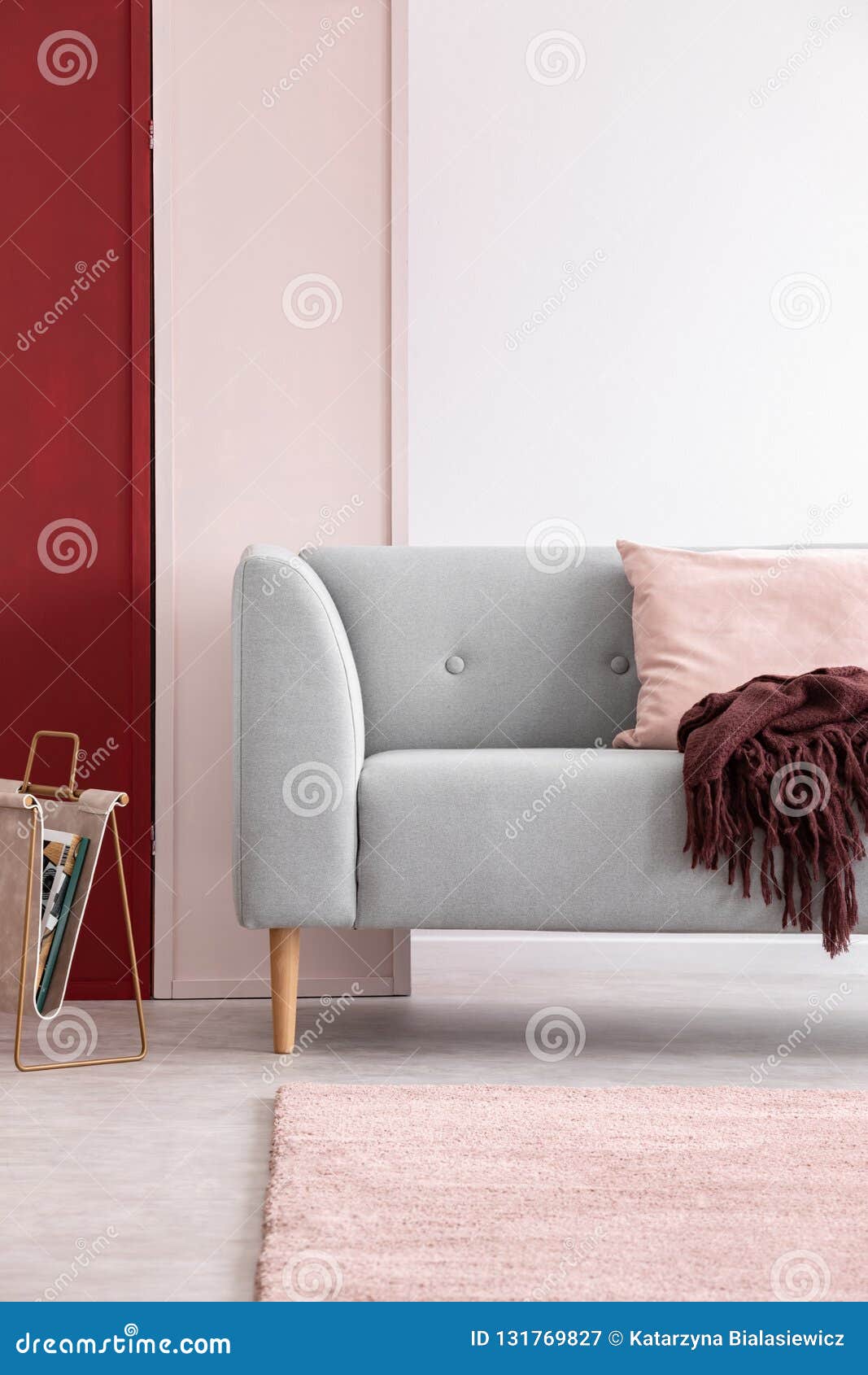 Grey Couch in Bright Living Room Interior with Three Colored Wall, Real  Photo Stock Image - Image of pink, interior: 131769827